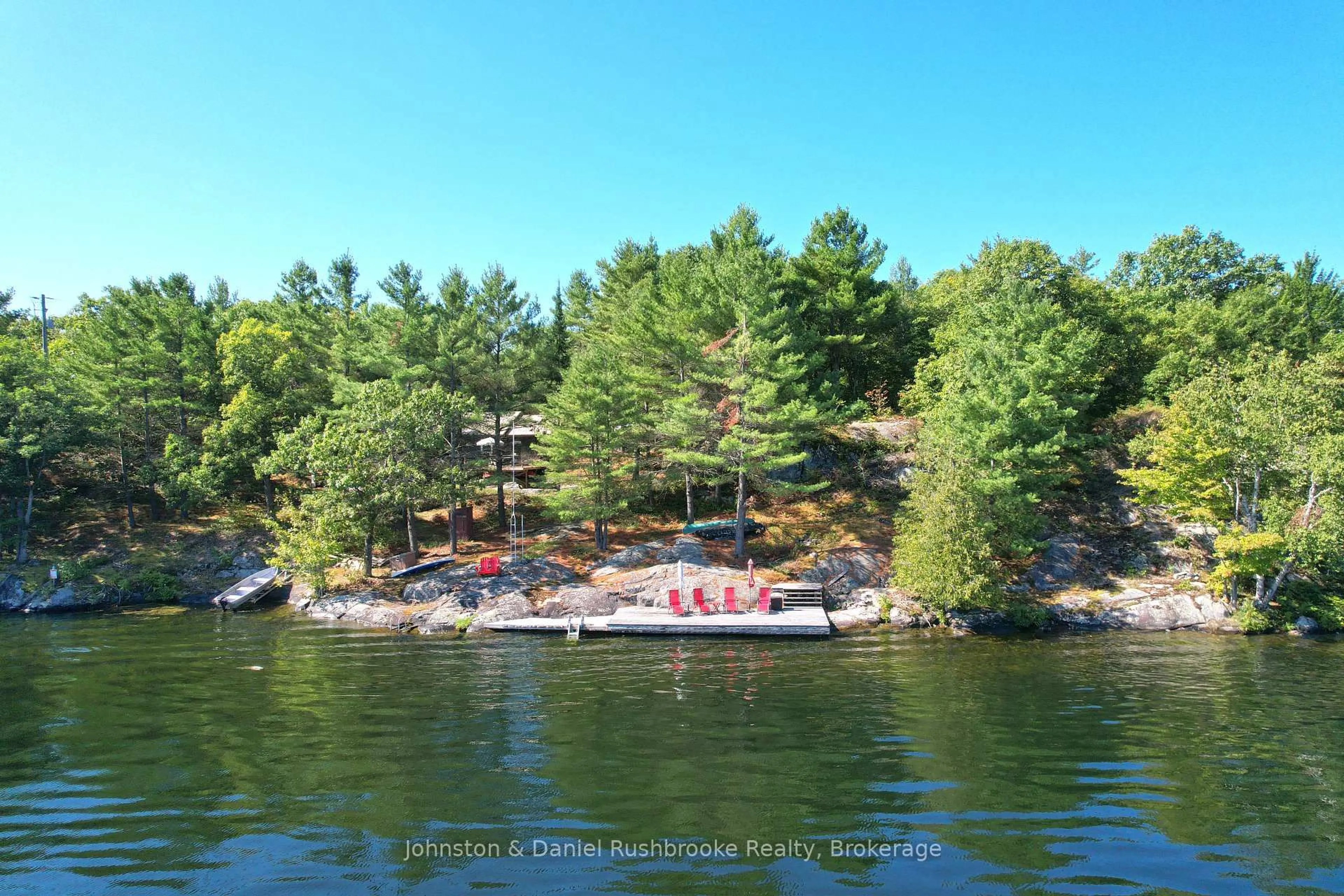 A pic from outside/outdoor area/front of a property/back of a property/a pic from drone, water/lake/river/ocean view for 148 Smooth Rock Rd, Georgian Bay Ontario L0K 1S0