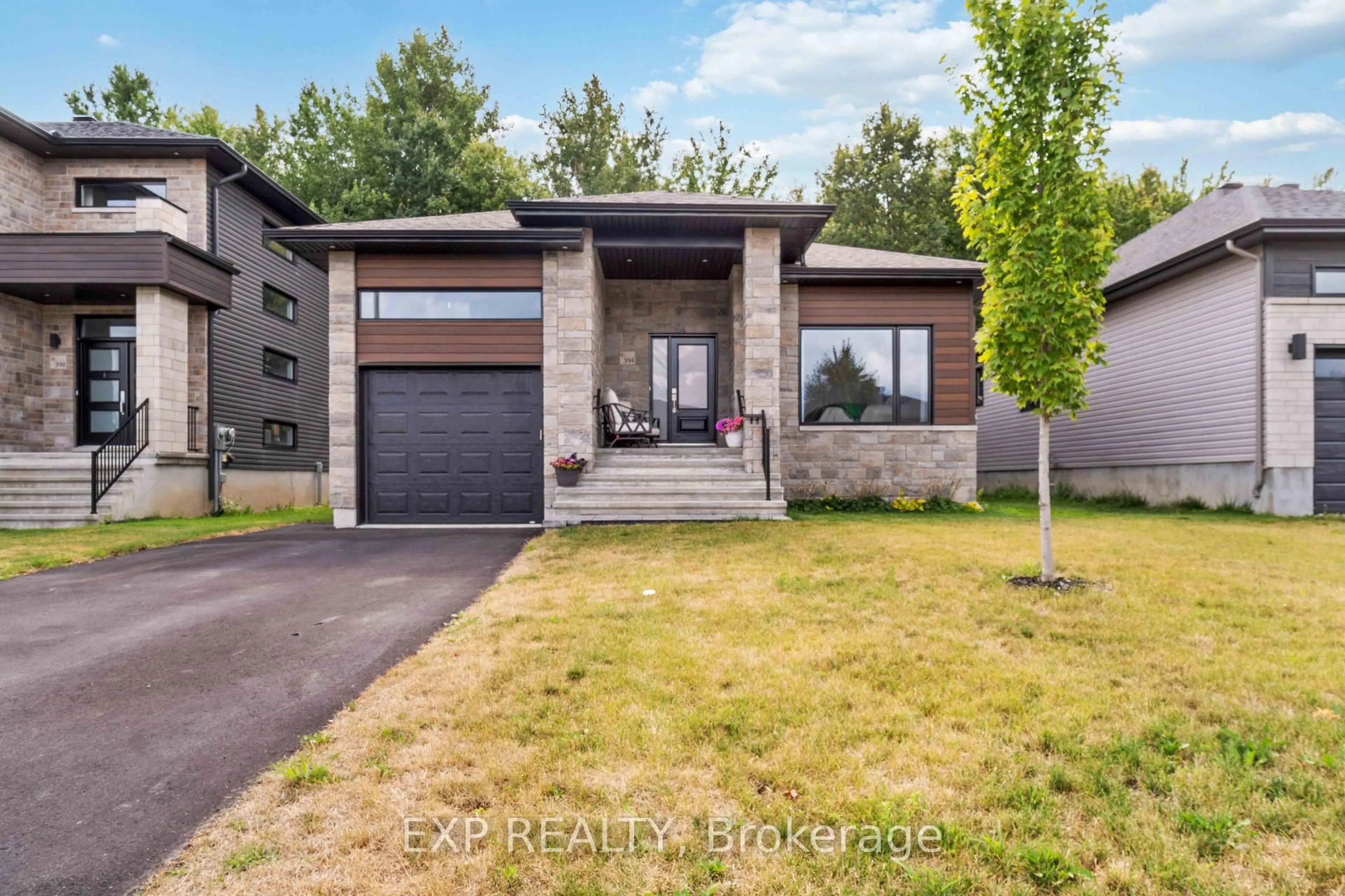 Home with brick exterior material, street for 394 Dore St, Casselman Ontario K0A 1M0