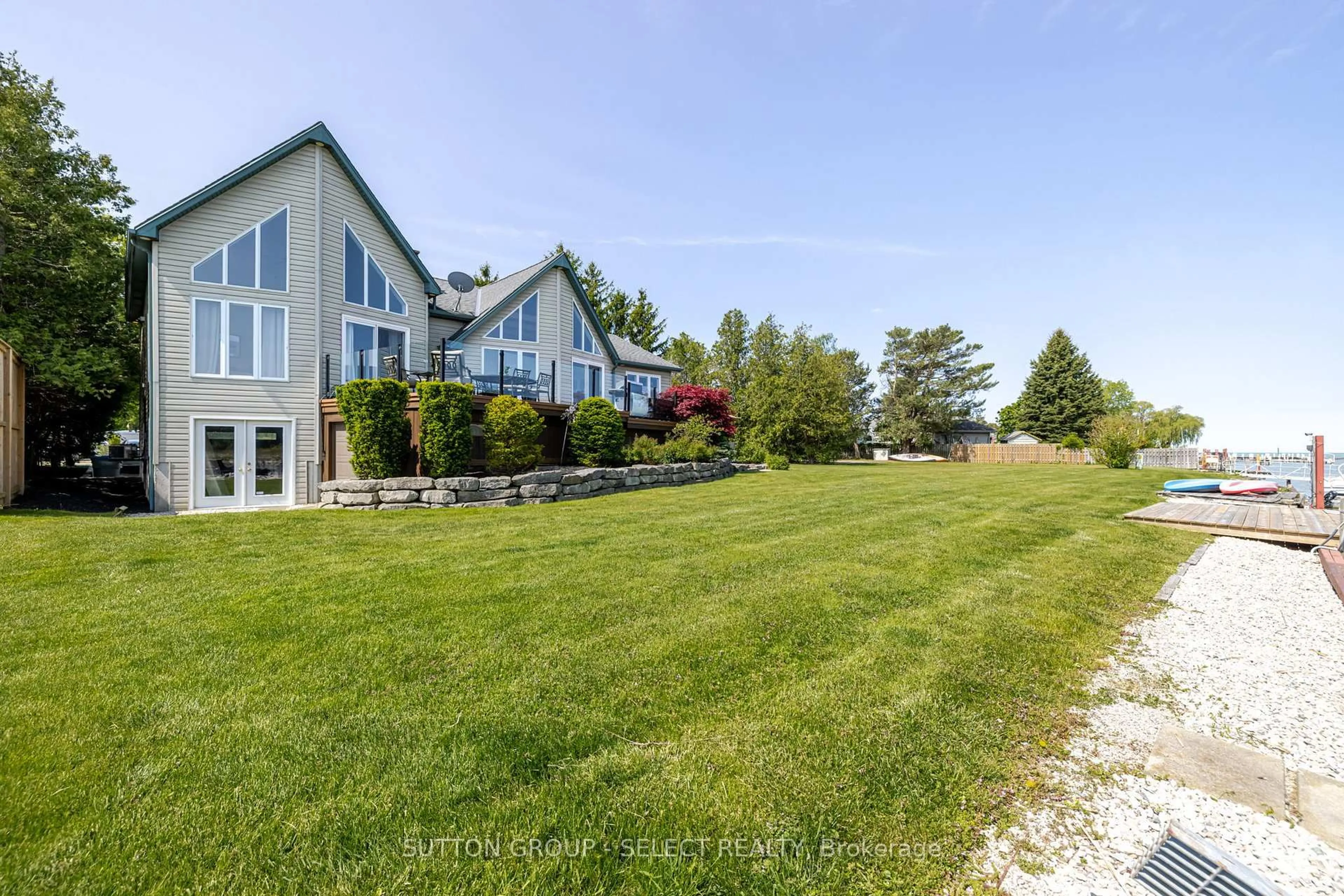 A pic from outside/outdoor area/front of a property/back of a property/a pic from drone, water/lake/river/ocean view for 7474 Riverside Dr, Lambton Shores Ontario N0M 2L0