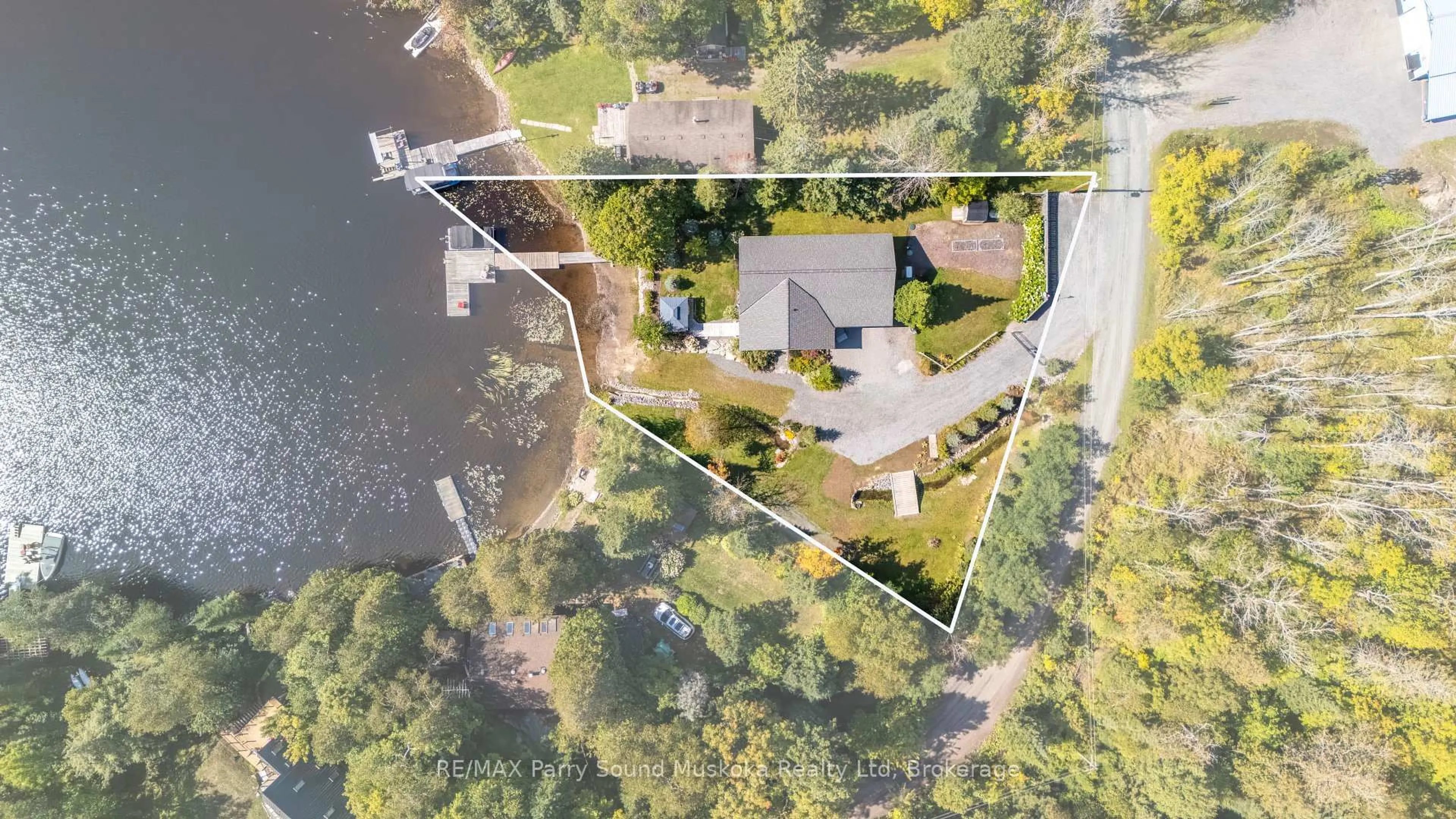 A pic from outside/outdoor area/front of a property/back of a property/a pic from drone, water/lake/river/ocean view for 41 Sunset Cove Rd, Seguin Ontario P2A 0B2