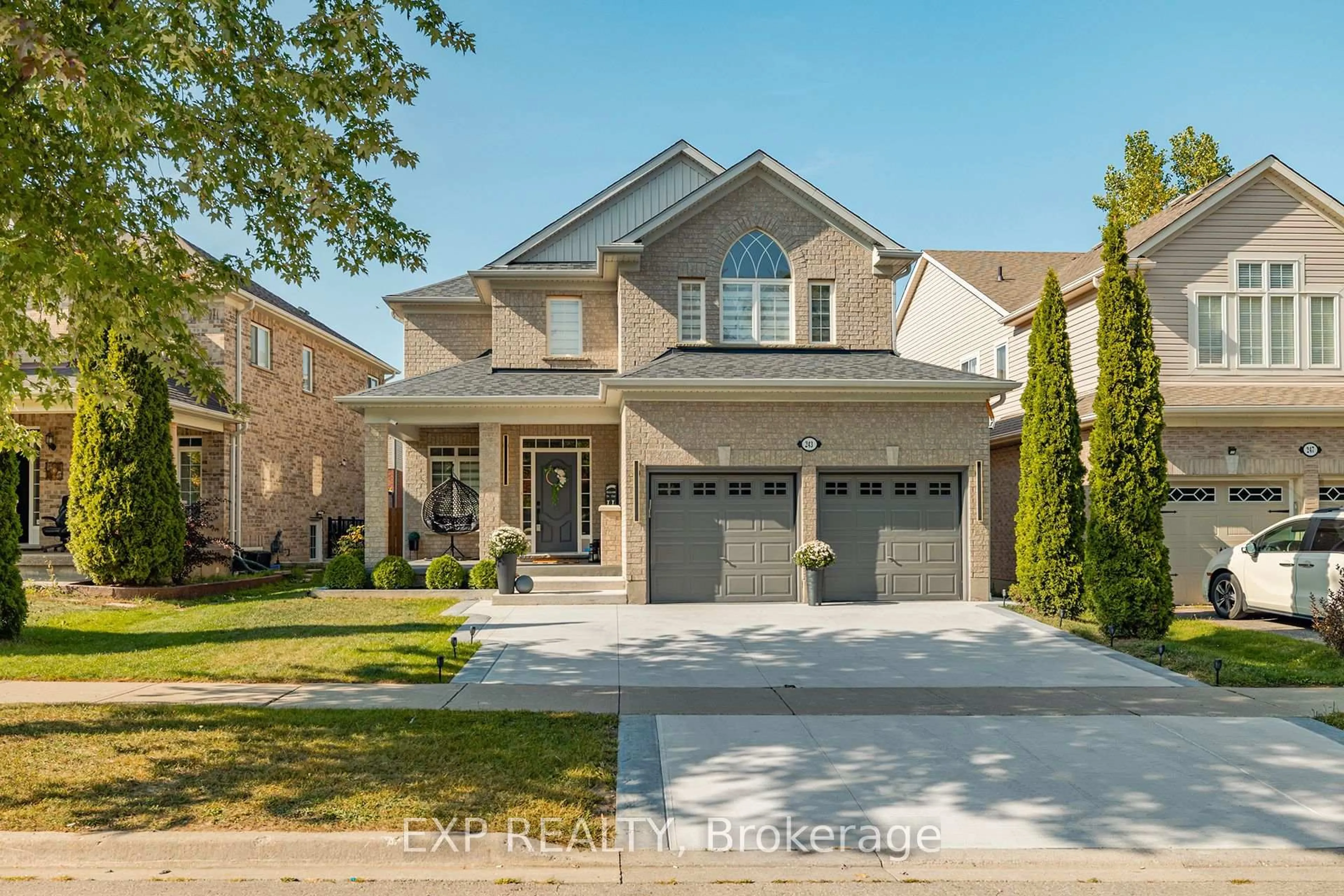Home with brick exterior material, street for 243 Sims Estate Dr, Kitchener Ontario N2A 4L4