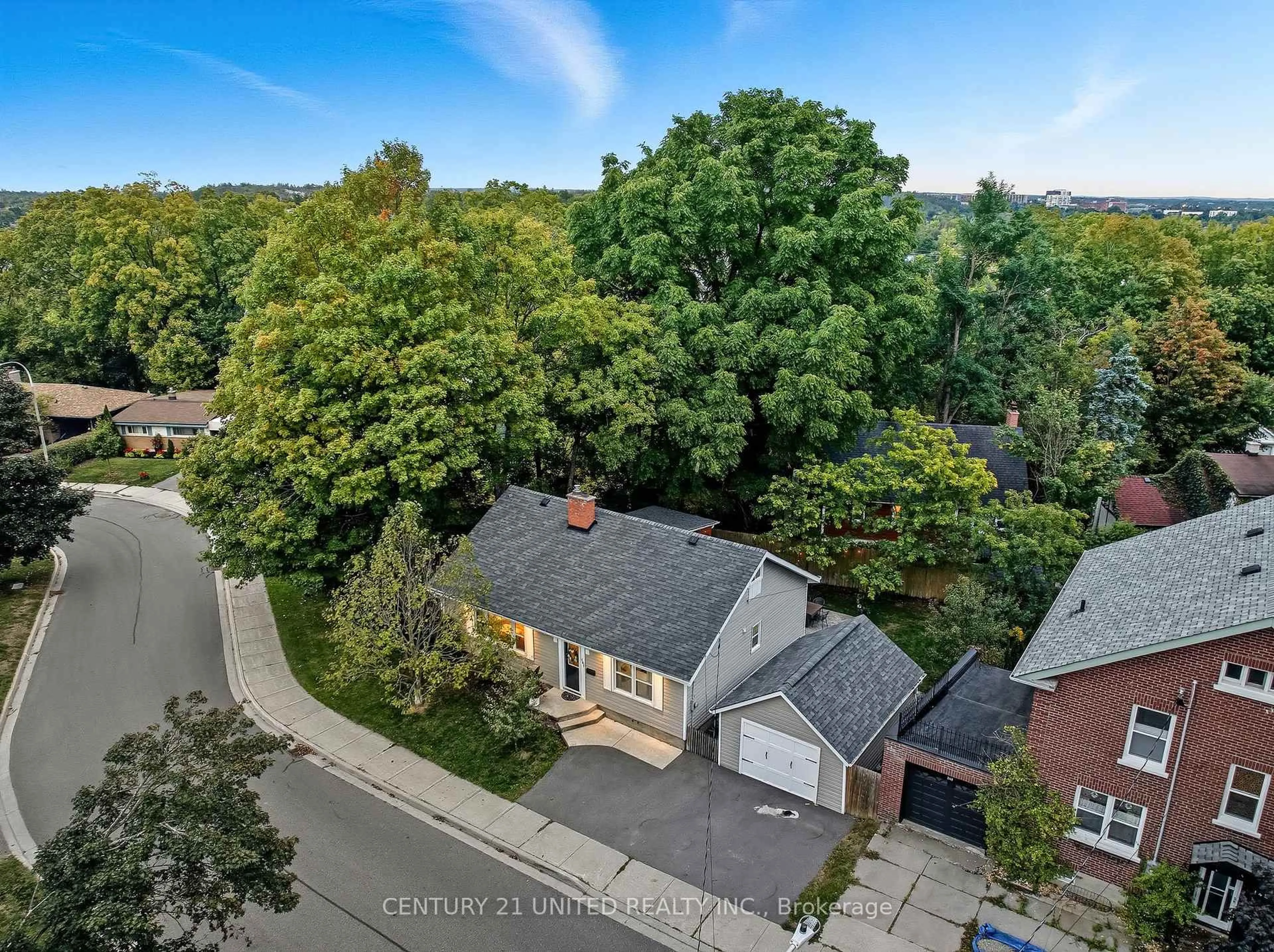 A pic from outside/outdoor area/front of a property/back of a property/a pic from drone, street for 141 O'Carroll Ave, Peterborough Ontario K9H 4V2