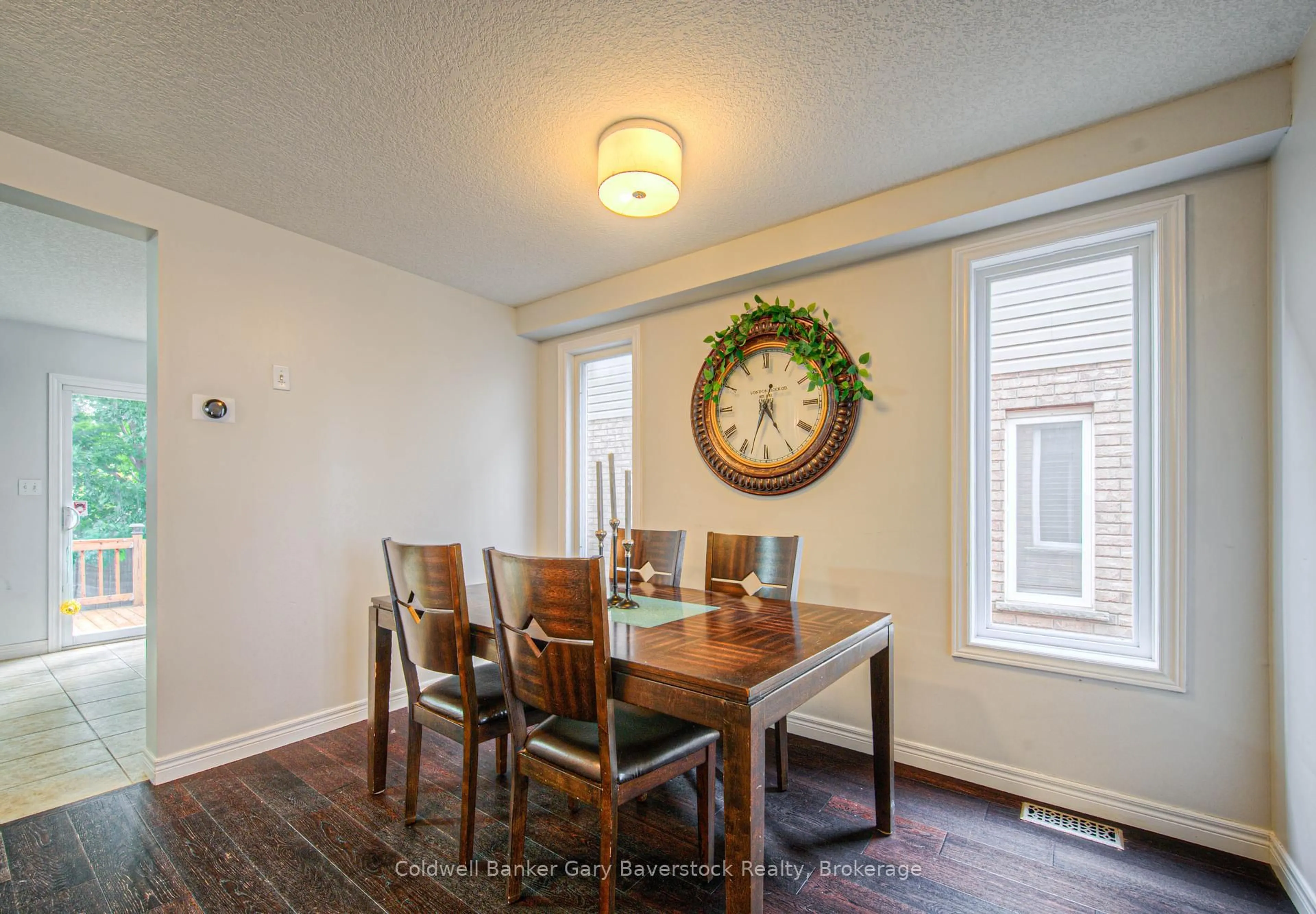 Dining room, wood/laminate floor for 18 Cranshaw St, Kitchener Ontario N2R 1W2