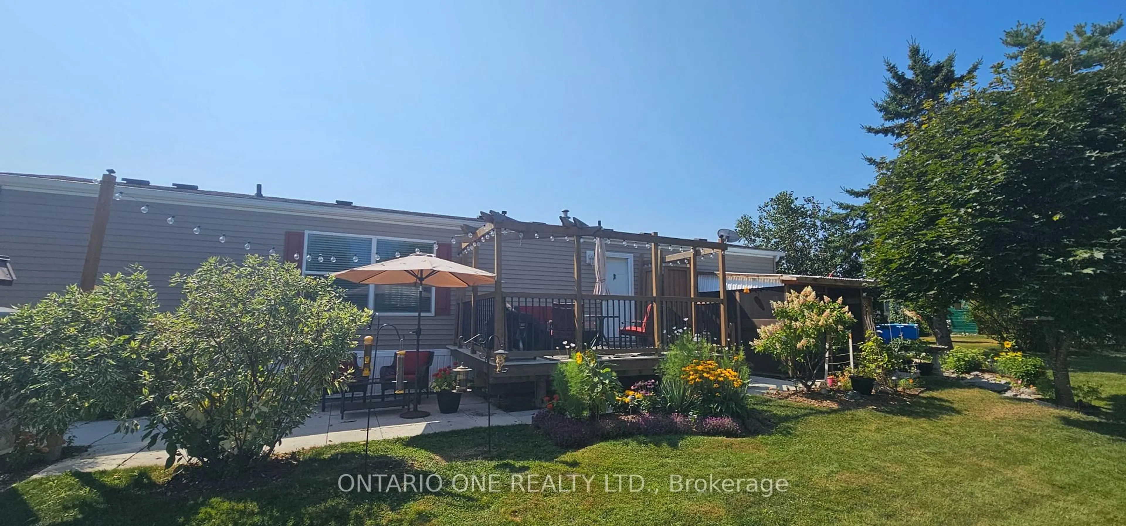 A pic from outside/outdoor area/front of a property/back of a property/a pic from drone, unknown for 2244 Heritage Line #21B, Otonabee-South Monaghan Ontario K9J 6X8