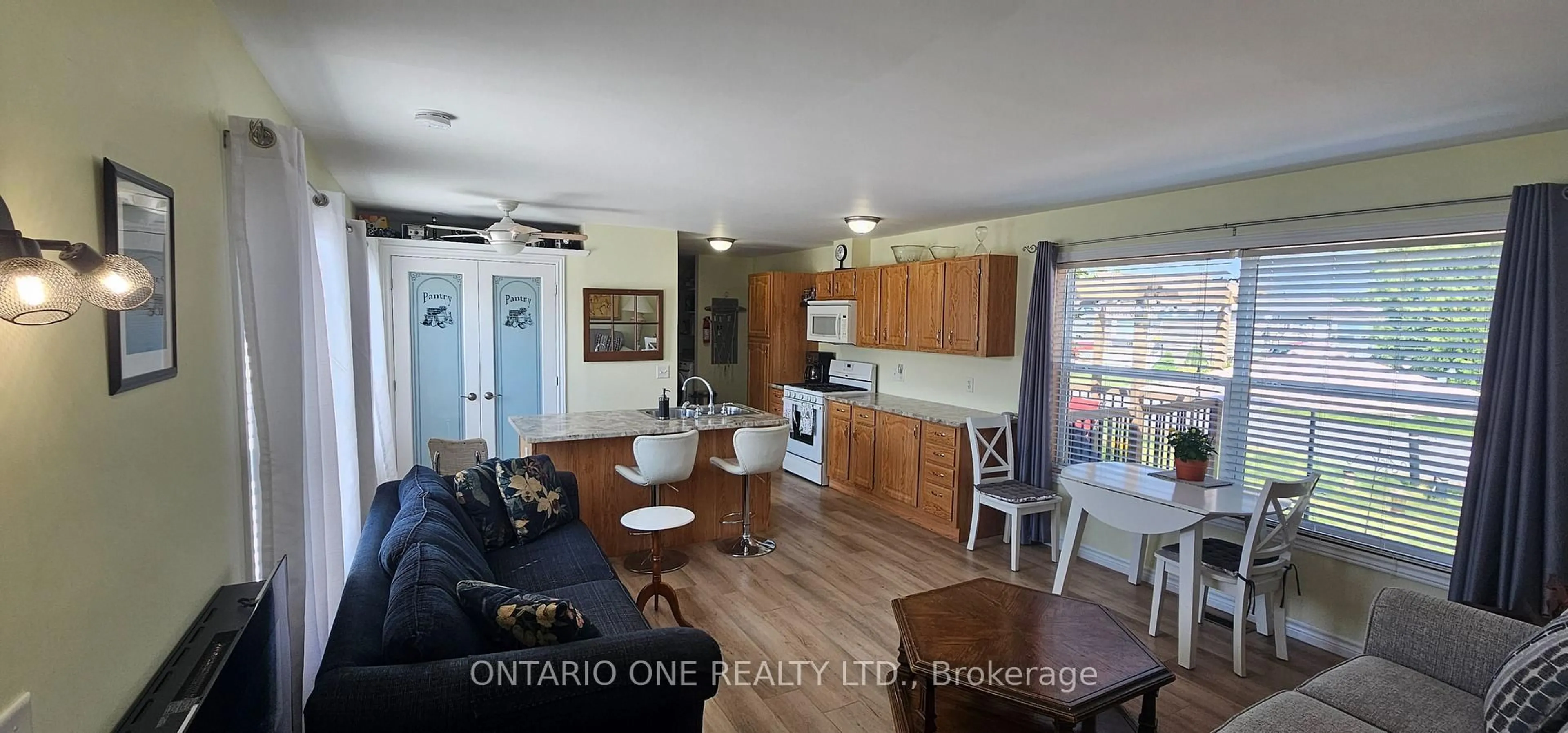 Open concept kitchen, wood/laminate floor for 2244 Heritage Line #21B, Otonabee-South Monaghan Ontario K9J 6X8