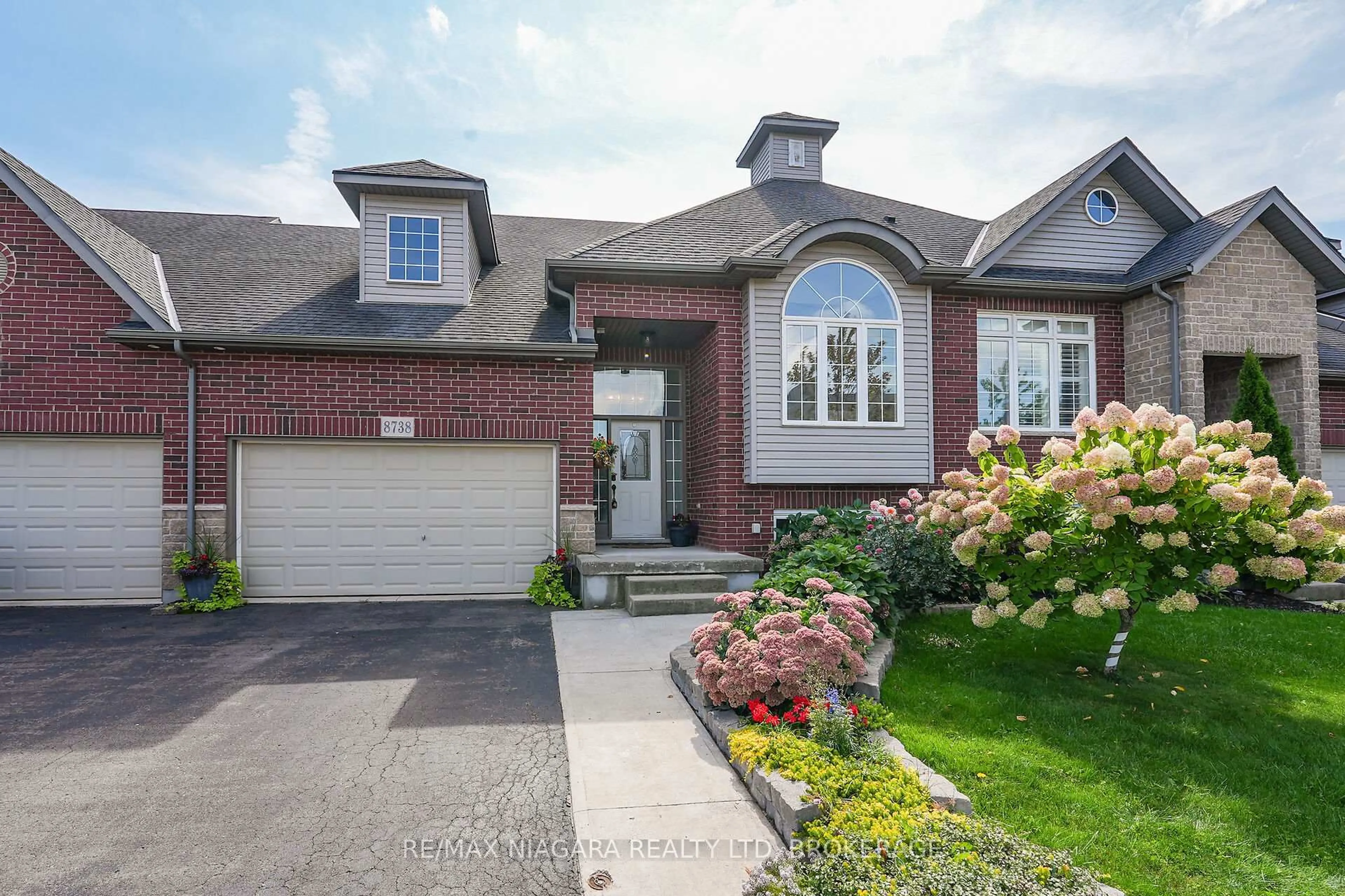 Home with brick exterior material, street for 8738 Upper Canada Dr, Niagara Falls Ontario L2H 0B8