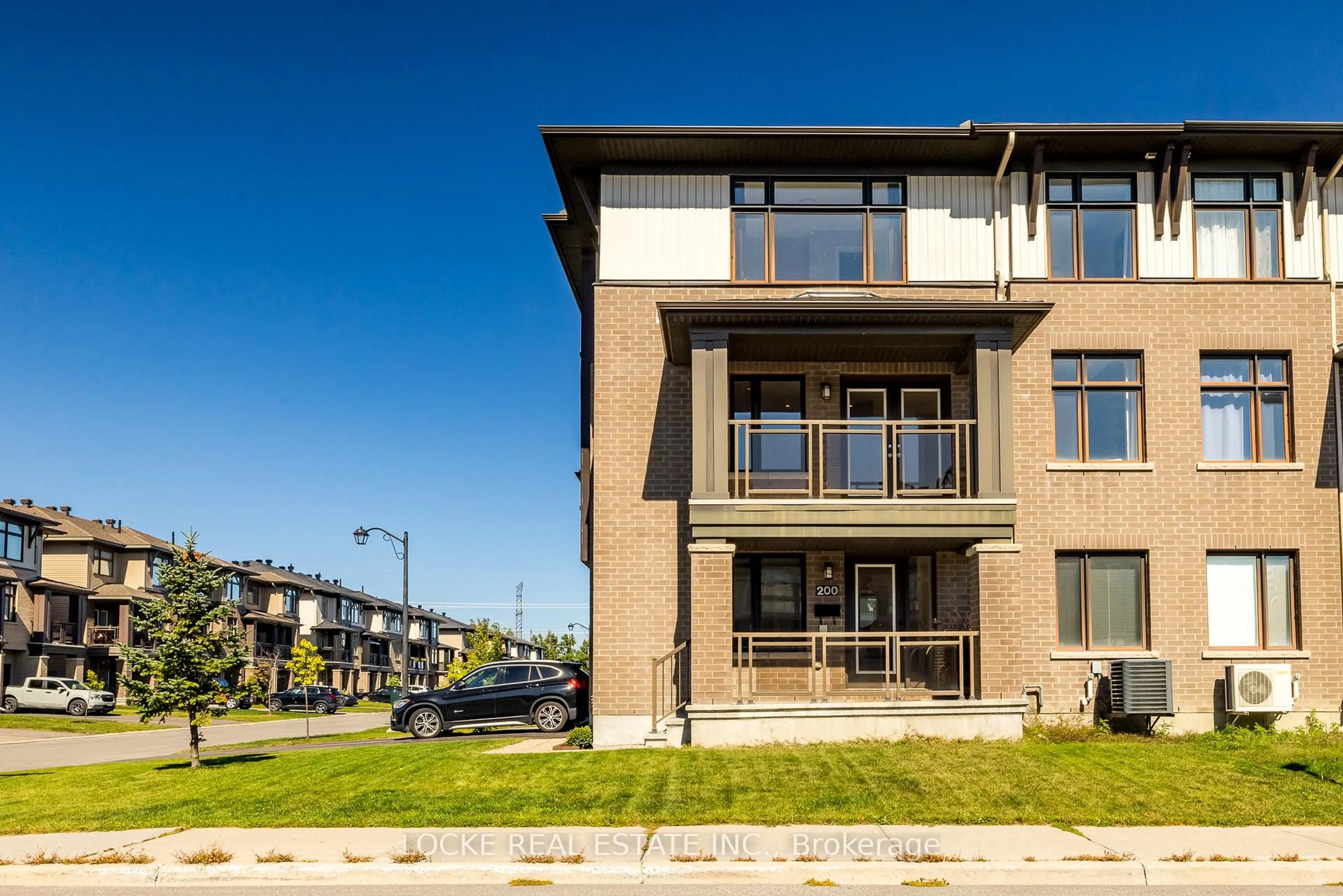 Home with brick exterior material, street for 200 Dragonfly Walk, Ottawa Ontario K1W 0J8