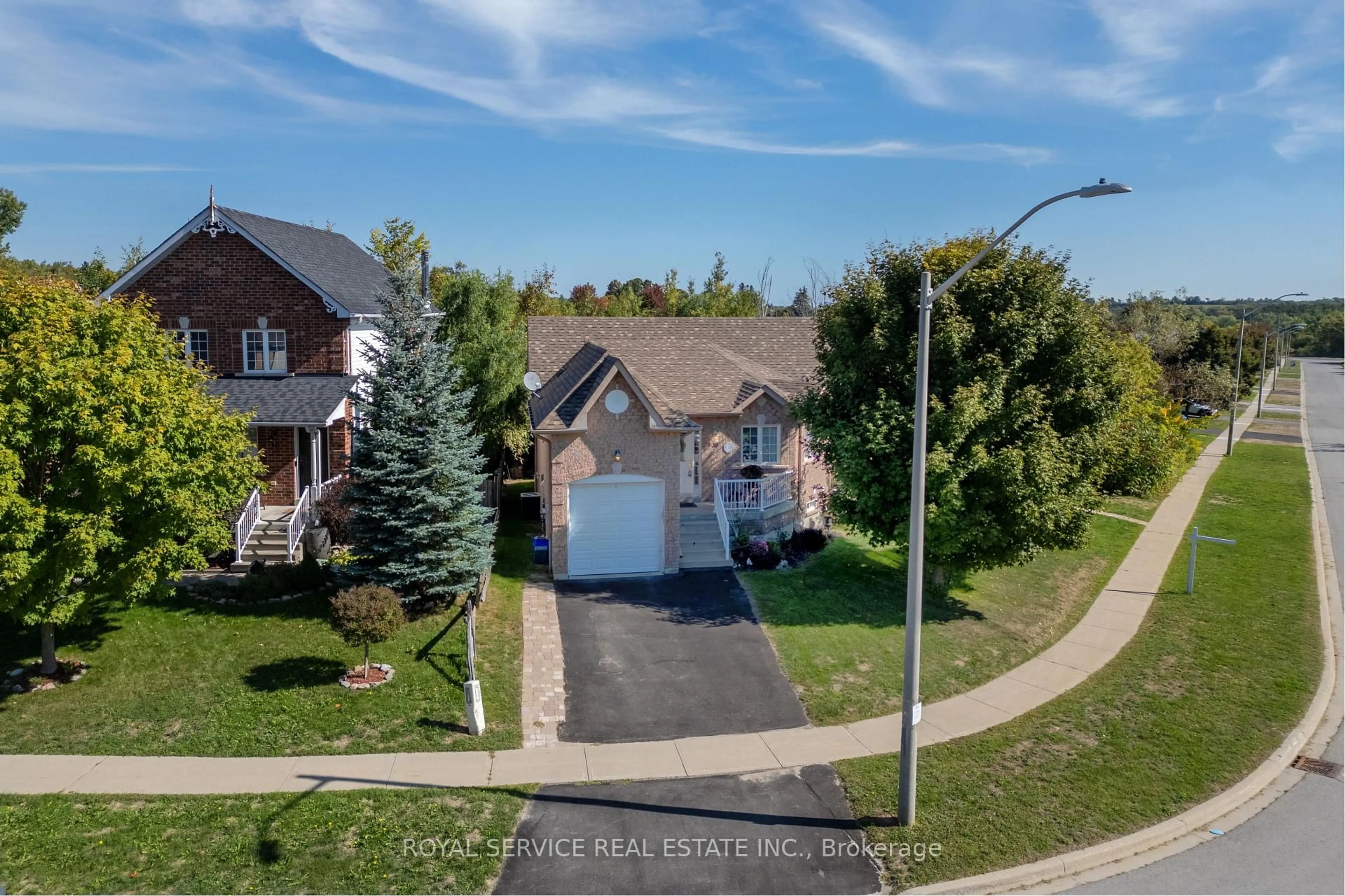 A pic from outside/outdoor area/front of a property/back of a property/a pic from drone, street for 30 Brookside St, Cavan Monaghan Ontario L0A 1G0