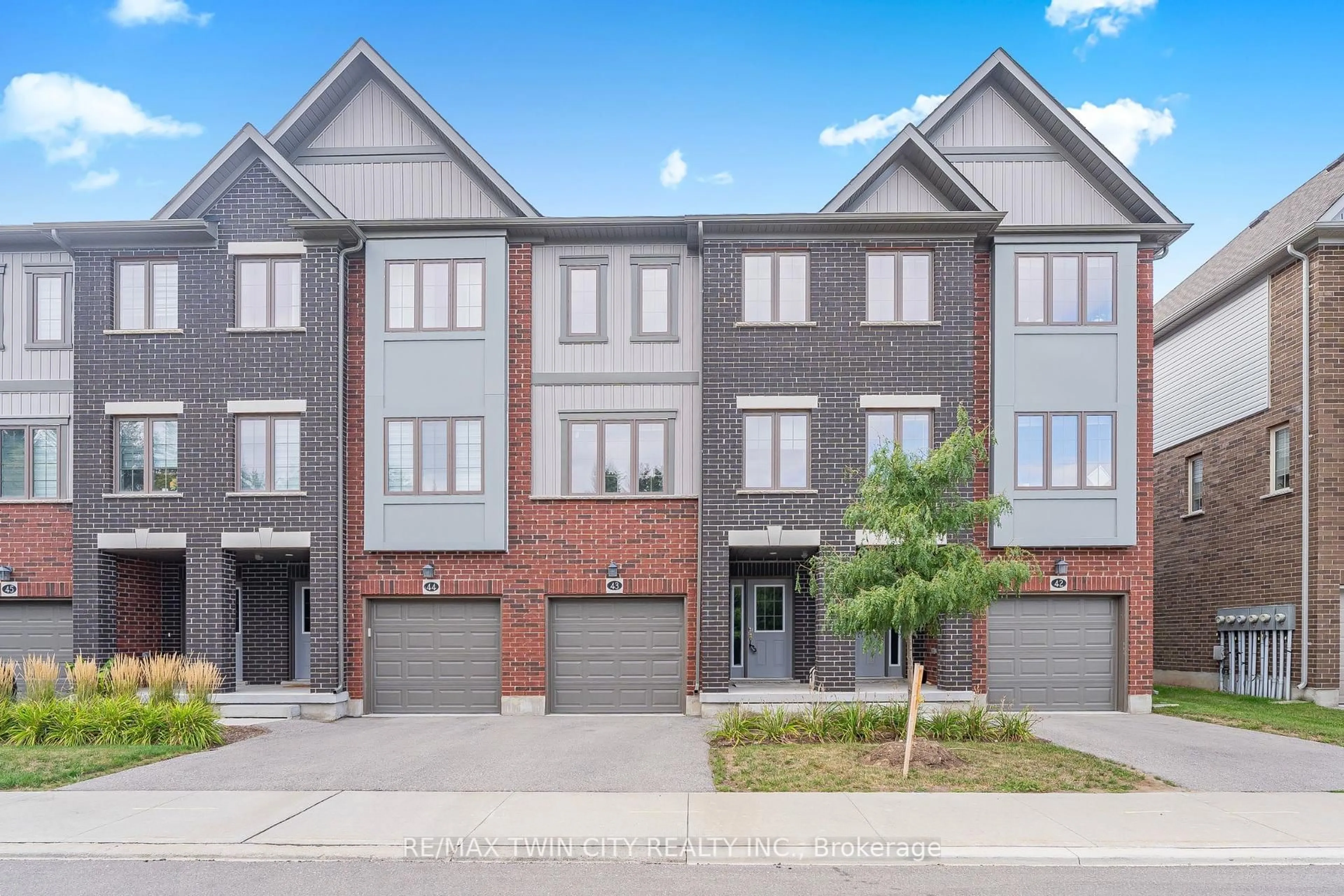 Home with brick exterior material, street for 311 Woolwich St #43, Waterloo Ontario N2K 0H4