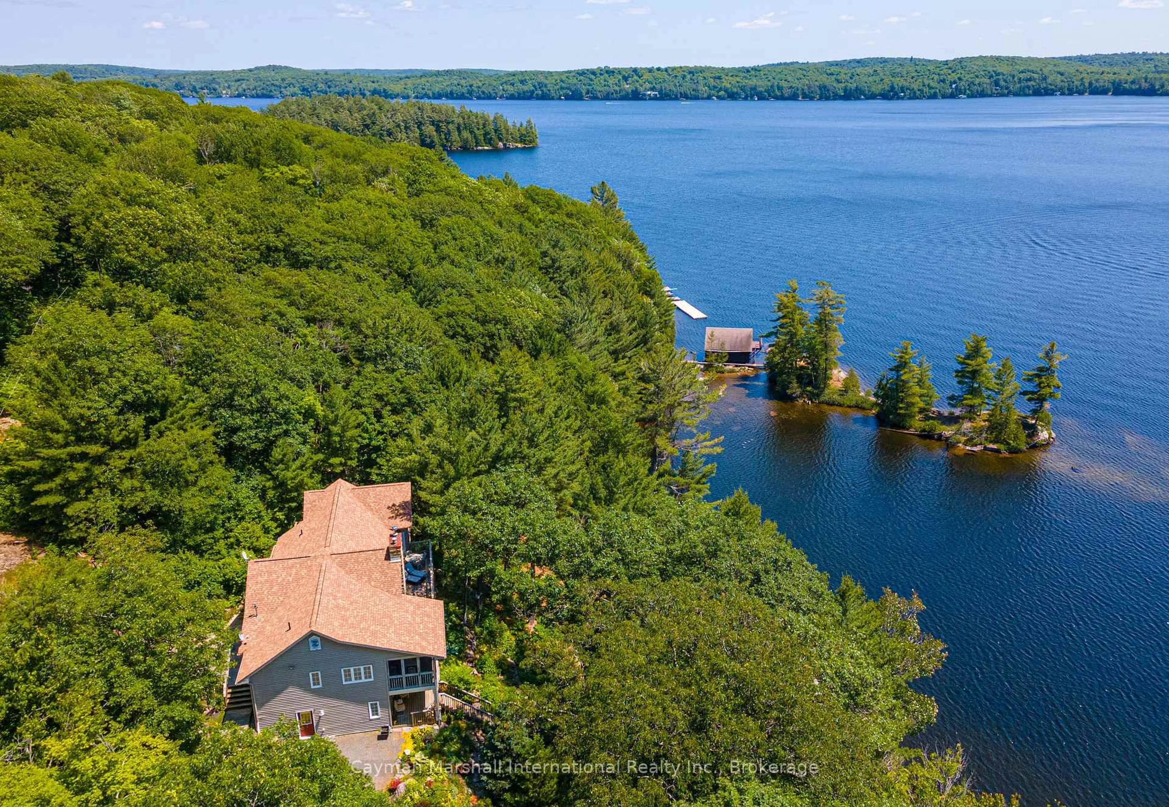 A pic from outside/outdoor area/front of a property/back of a property/a pic from drone, water/lake/river/ocean view for 1114 North Burnt Island Rd, Lake of Bays Ontario P0B 1A0