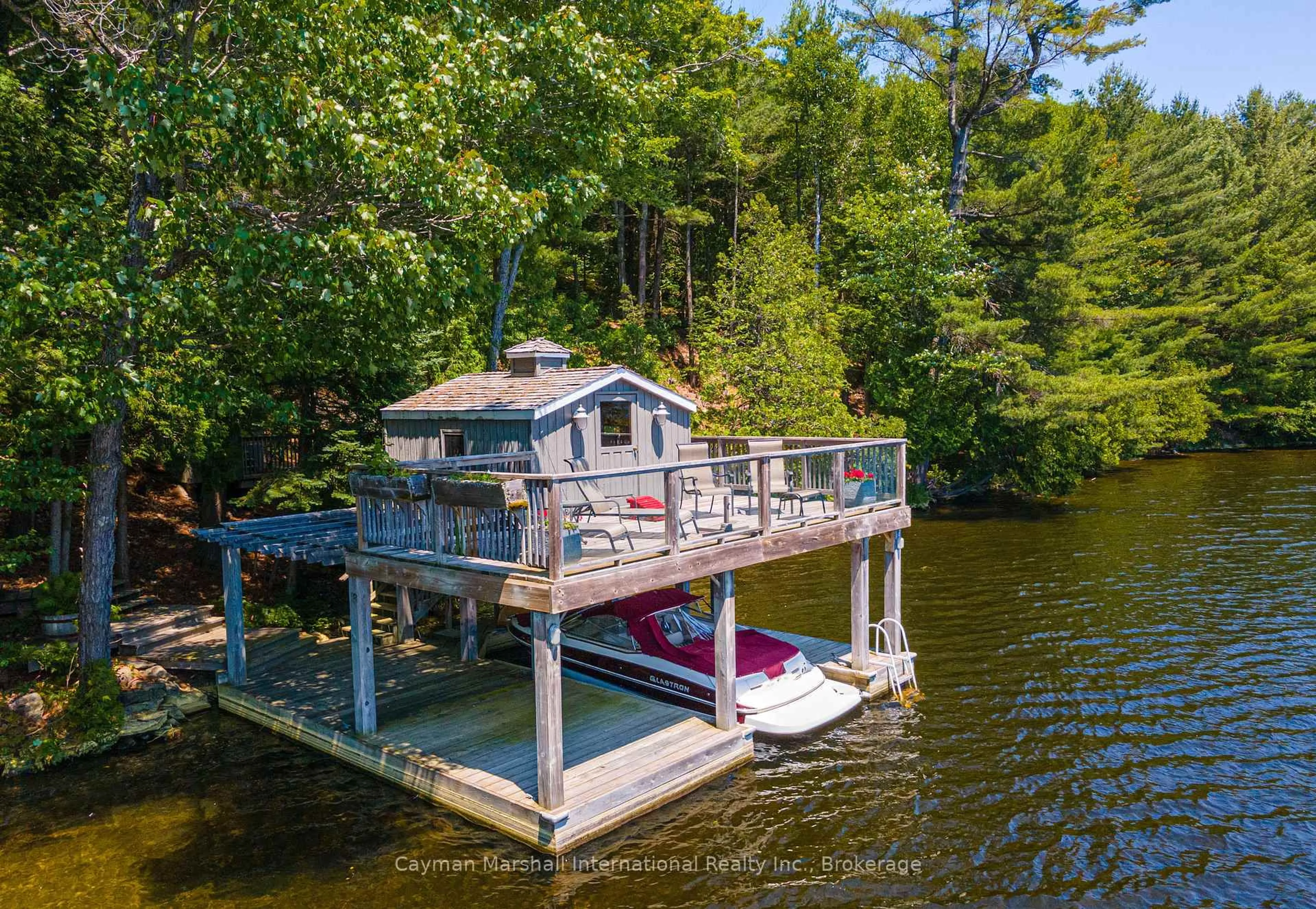 A pic from outside/outdoor area/front of a property/back of a property/a pic from drone, water/lake/river/ocean view for 1114 North Burnt Island Rd, Lake of Bays Ontario P0B 1A0