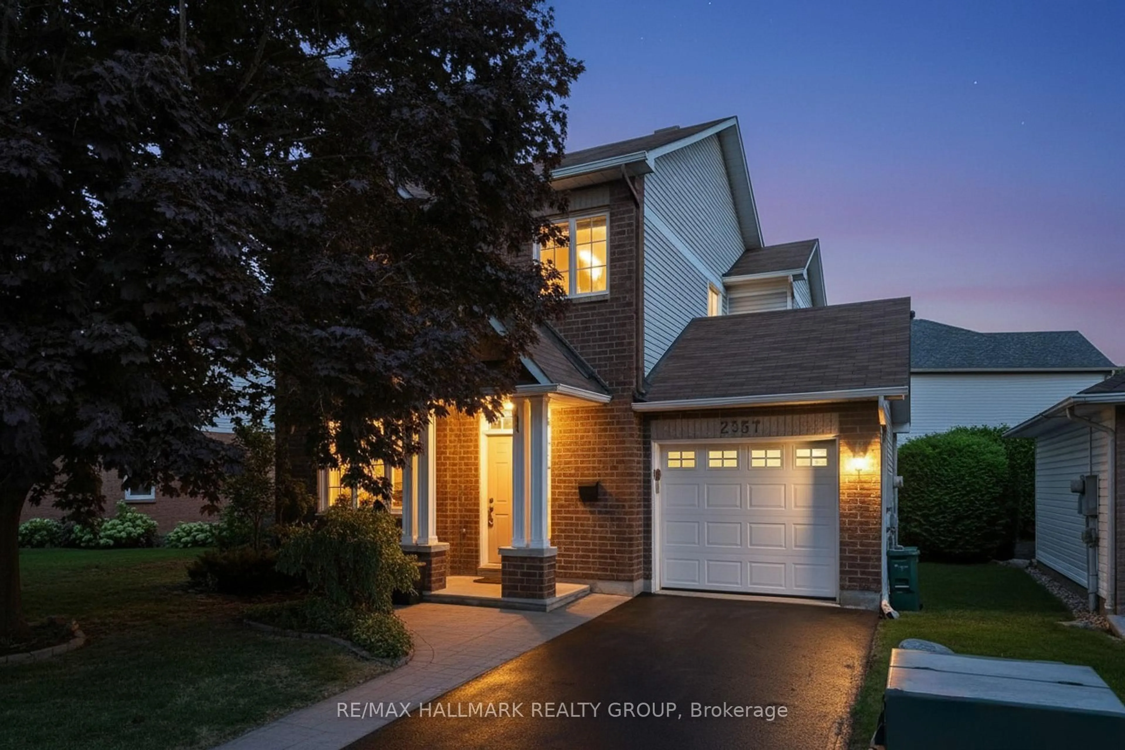 Home with brick exterior material, street for 2357 Raintree Dr, Orleans Ontario K1W 1J3