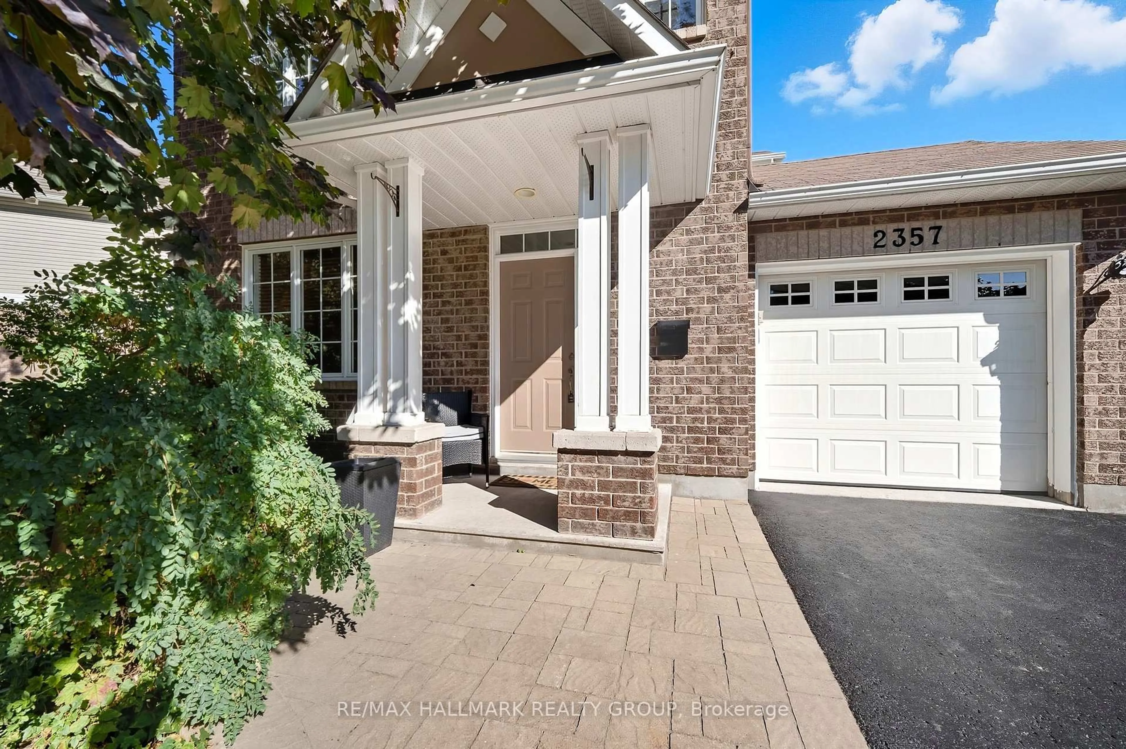 Home with brick exterior material, street for 2357 Raintree Dr, Orleans Ontario K1W 1J3