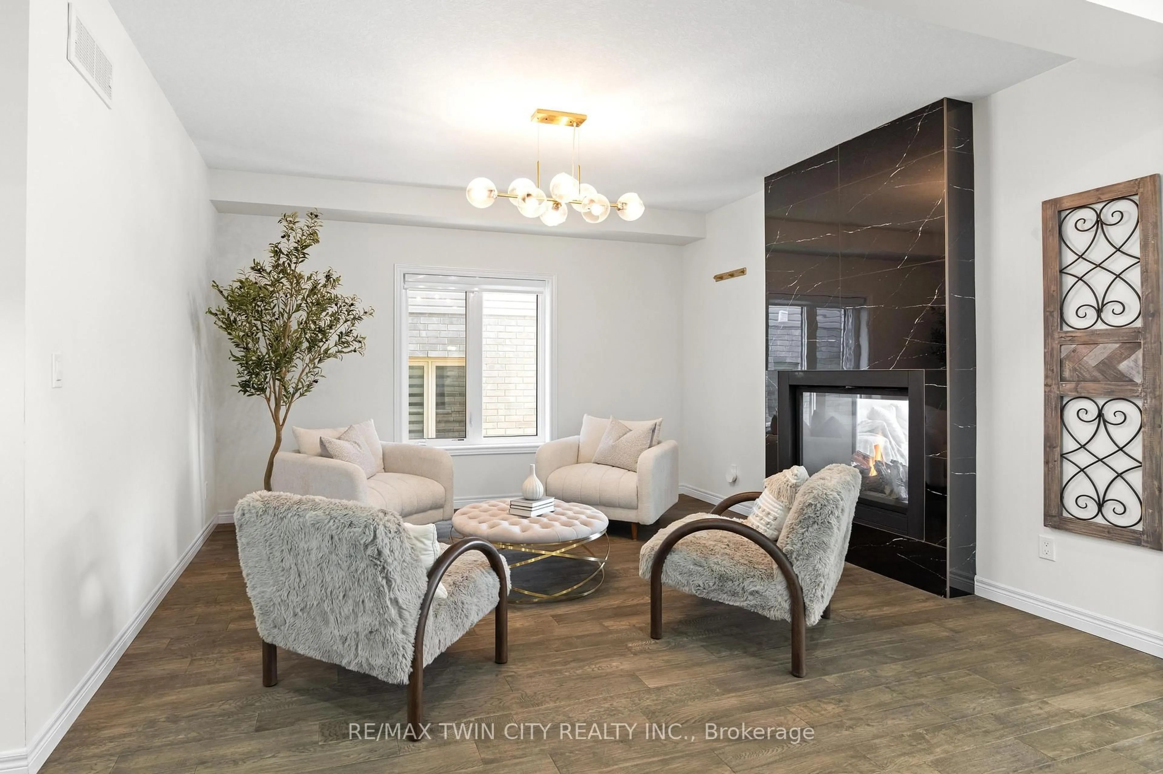 Living room with furniture, wood/laminate floor for 297 Blair Creek Dr, Kitchener Ontario N2P 0G4