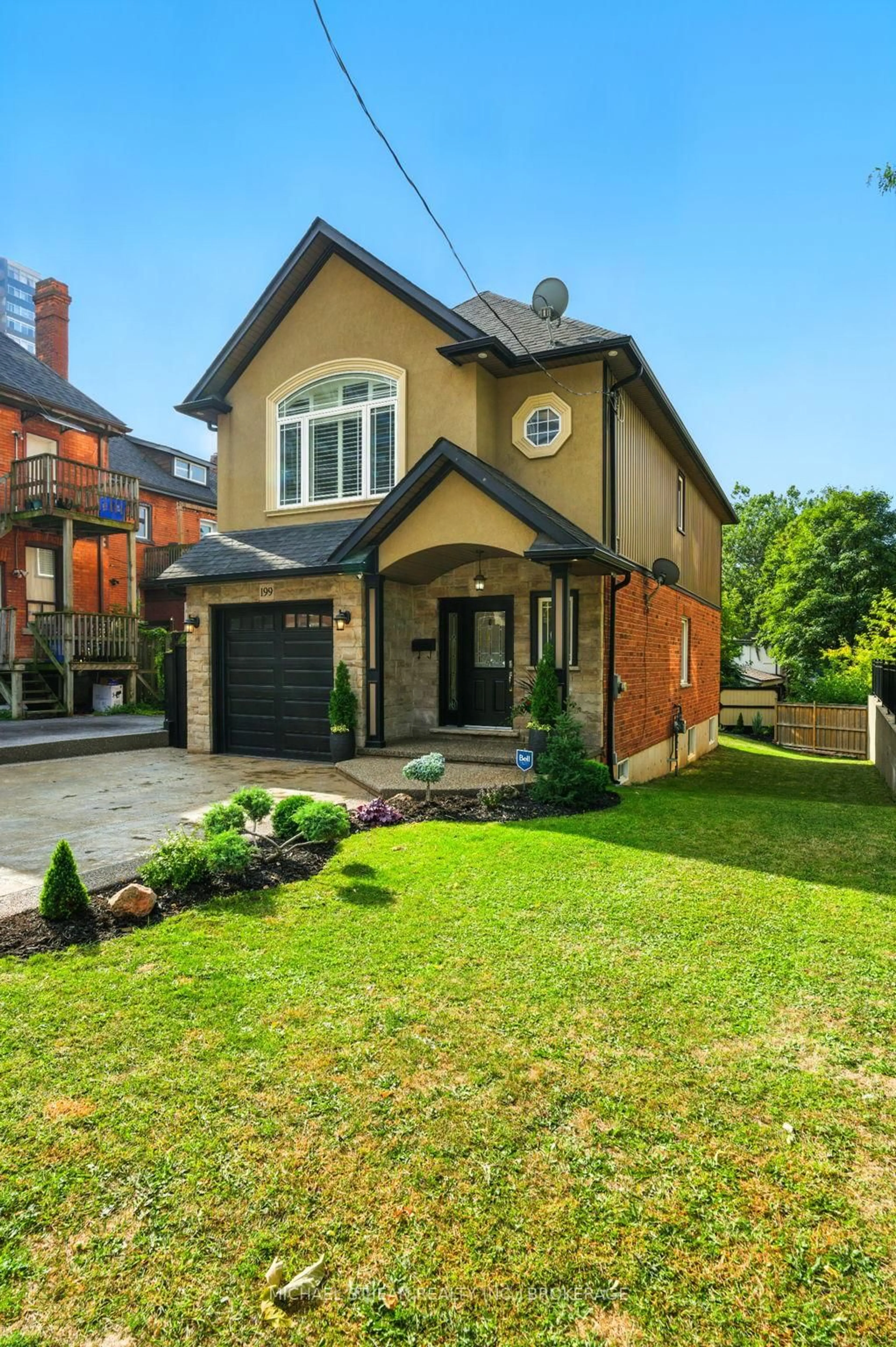 Home with brick exterior material, street for 199 Hunter St, Hamilton Ontario L8P 1R7