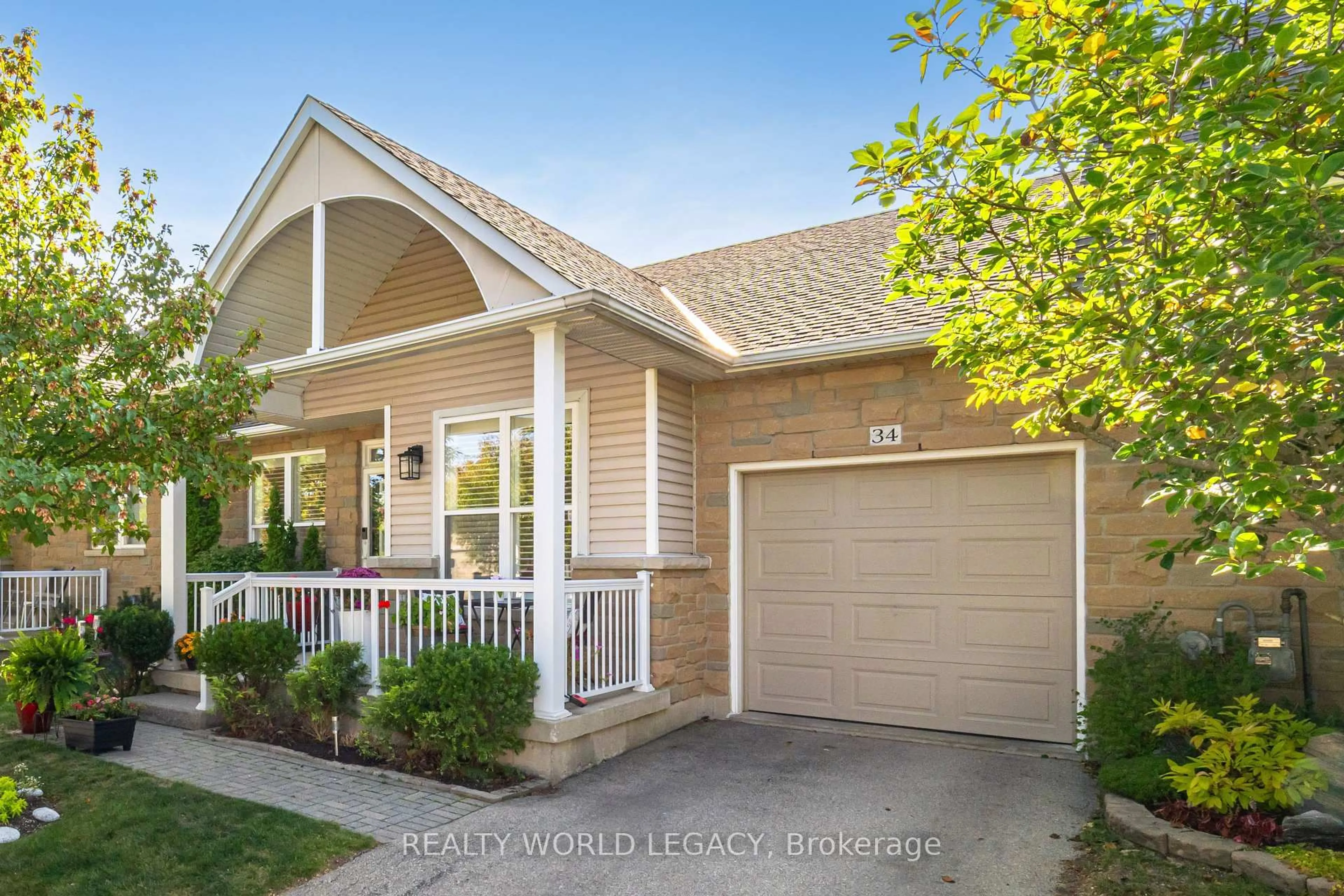 Home with vinyl exterior material, street for 20 Kitty Murray Lane #34, Hamilton Ontario L9K 1L7