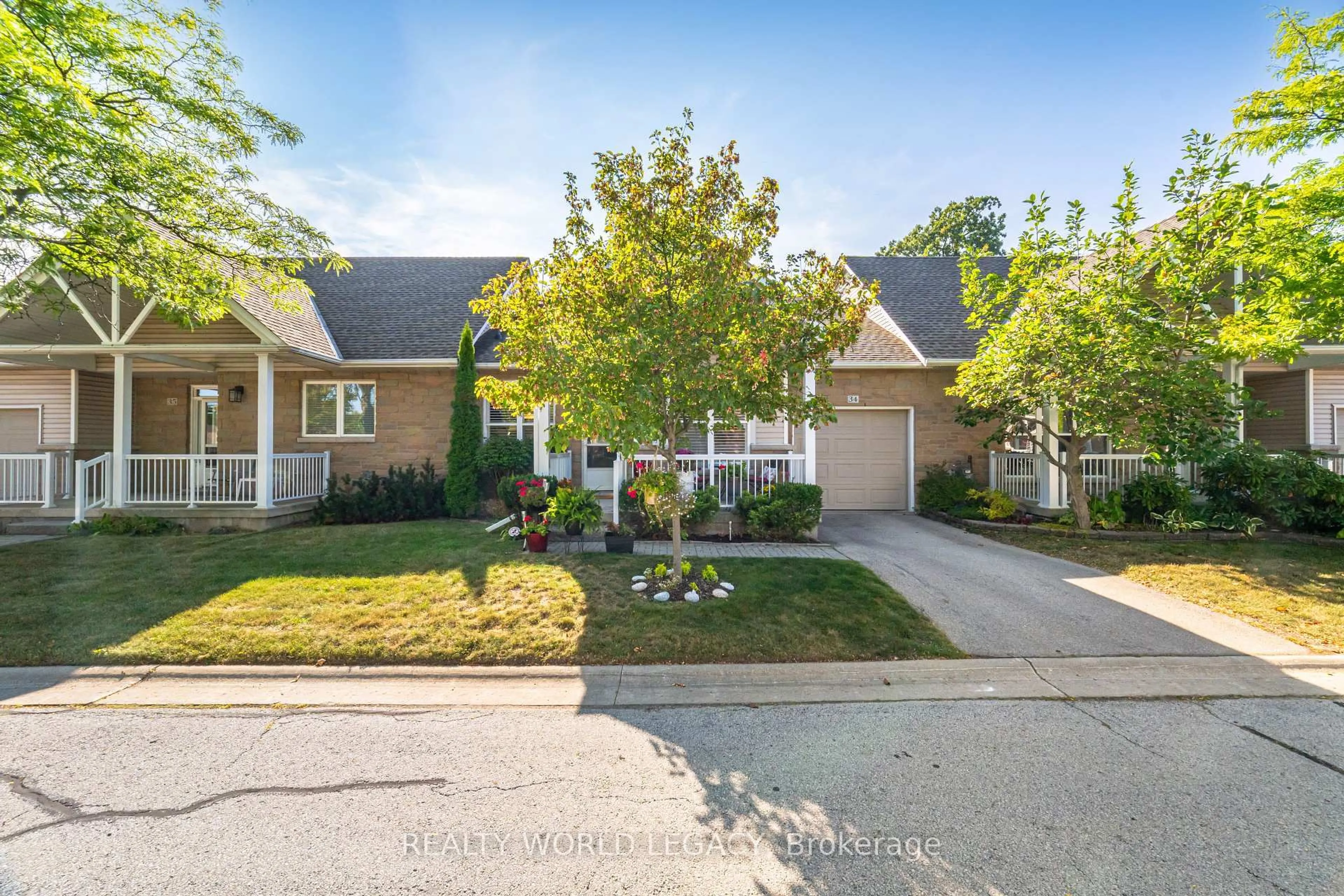 Home with brick exterior material, street for 20 Kitty Murray Lane #34, Hamilton Ontario L9K 1L7