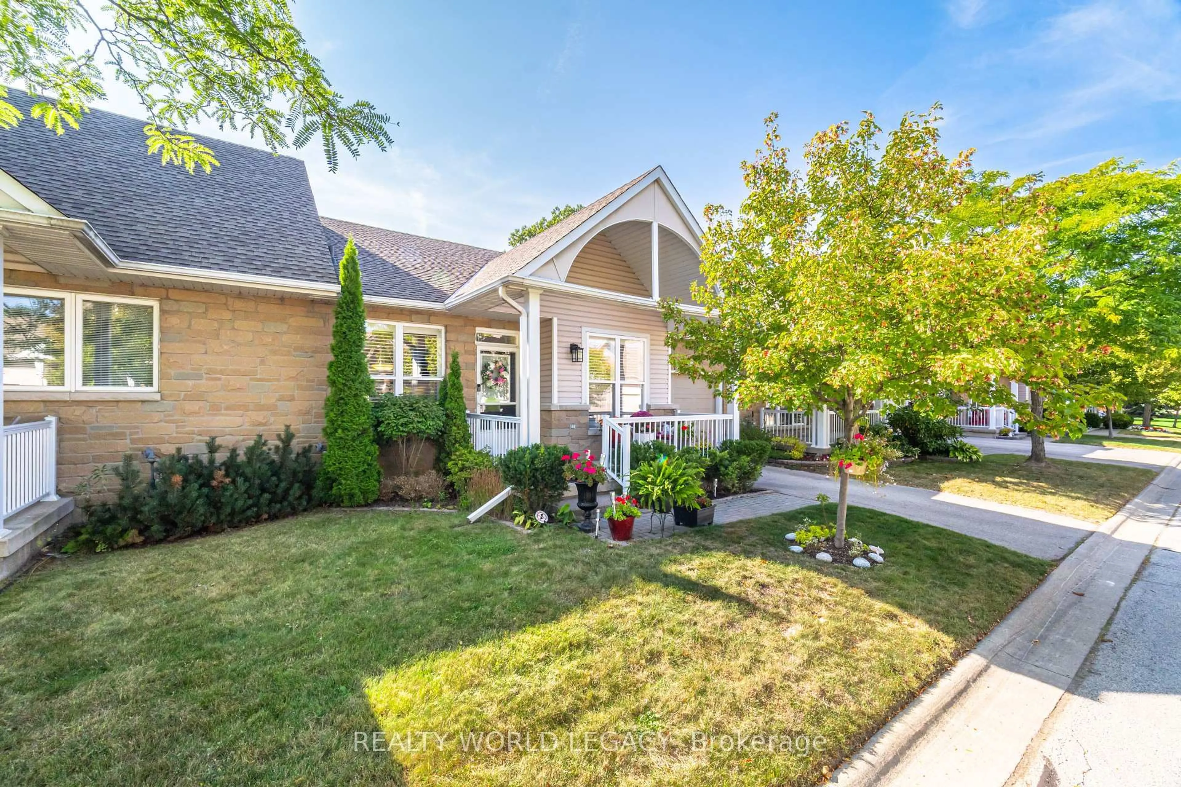 Home with brick exterior material, street for 20 Kitty Murray Lane #34, Hamilton Ontario L9K 1L7