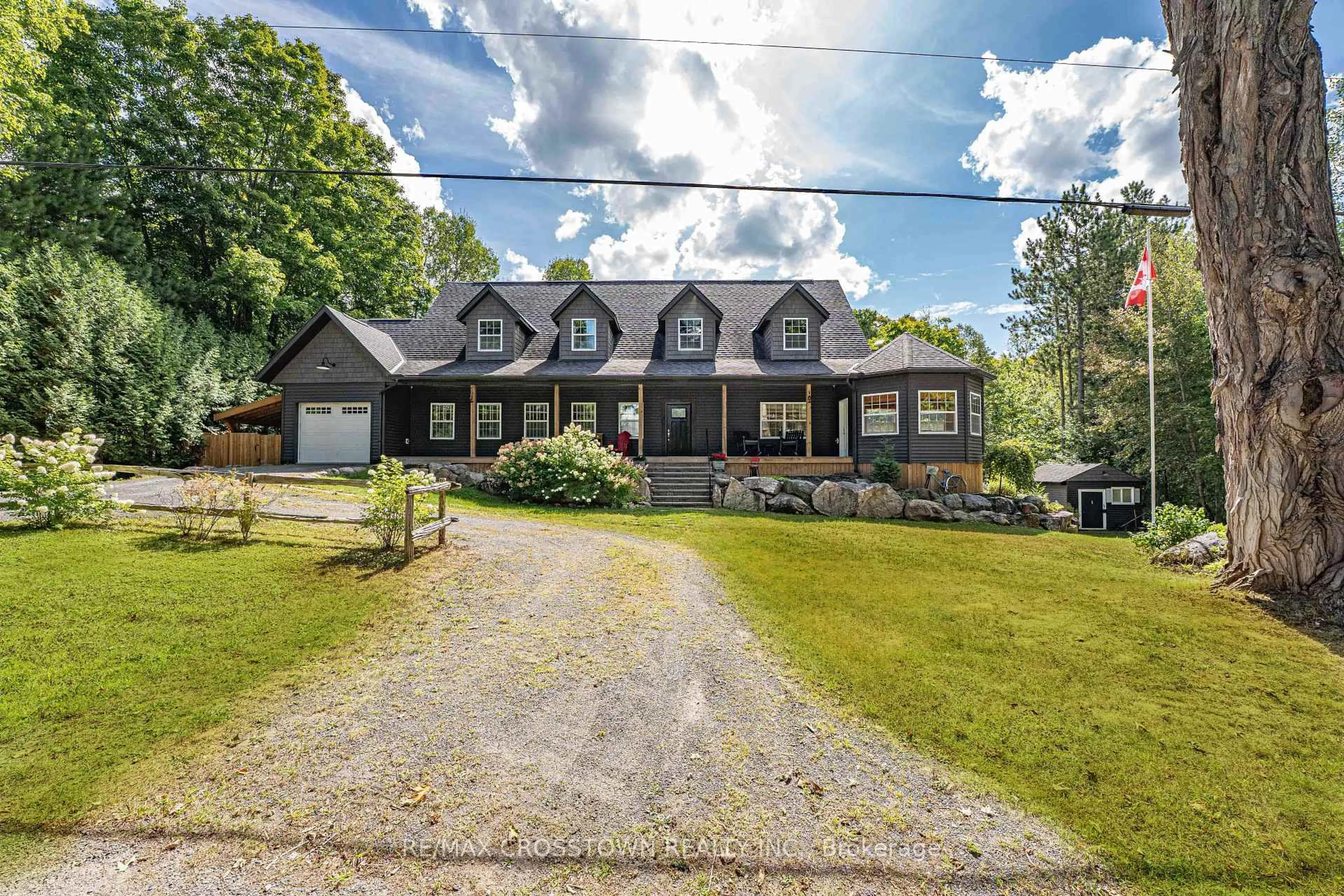 A pic from outside/outdoor area/front of a property/back of a property/a pic from drone, street for 1186 Upper Paudash Rd, Highlands East Ontario K0L 1C0