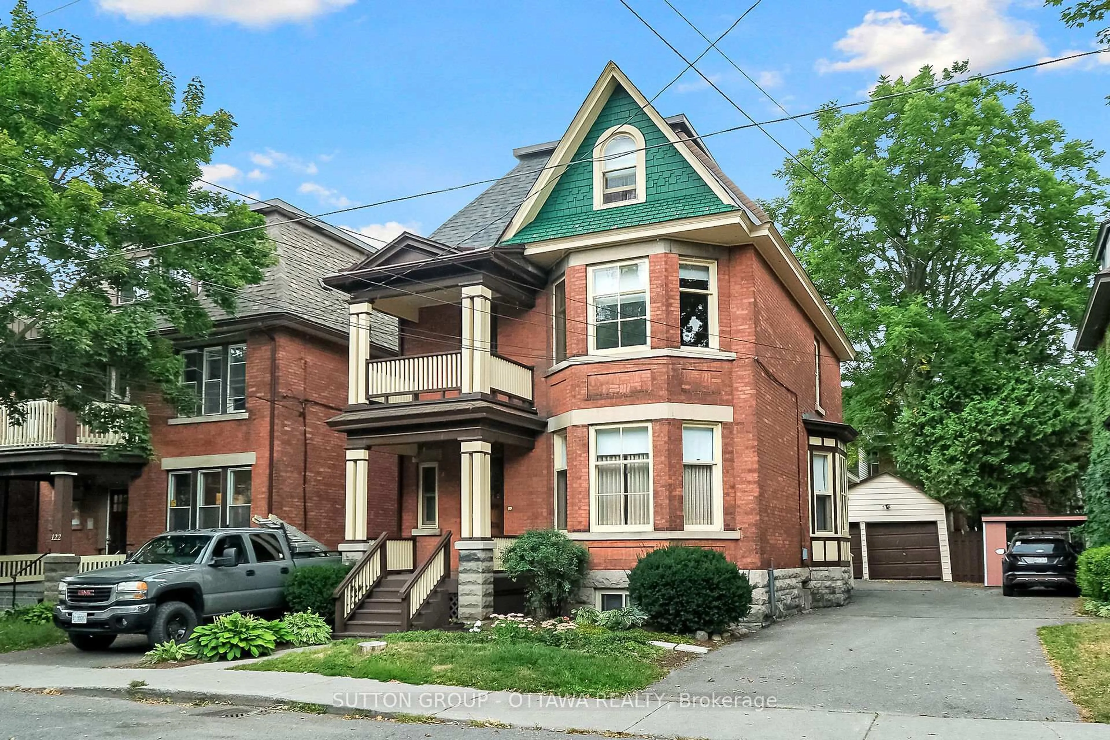 Home with brick exterior material, street for 124 Fourth Ave, Ottawa Ontario K1S 2L4