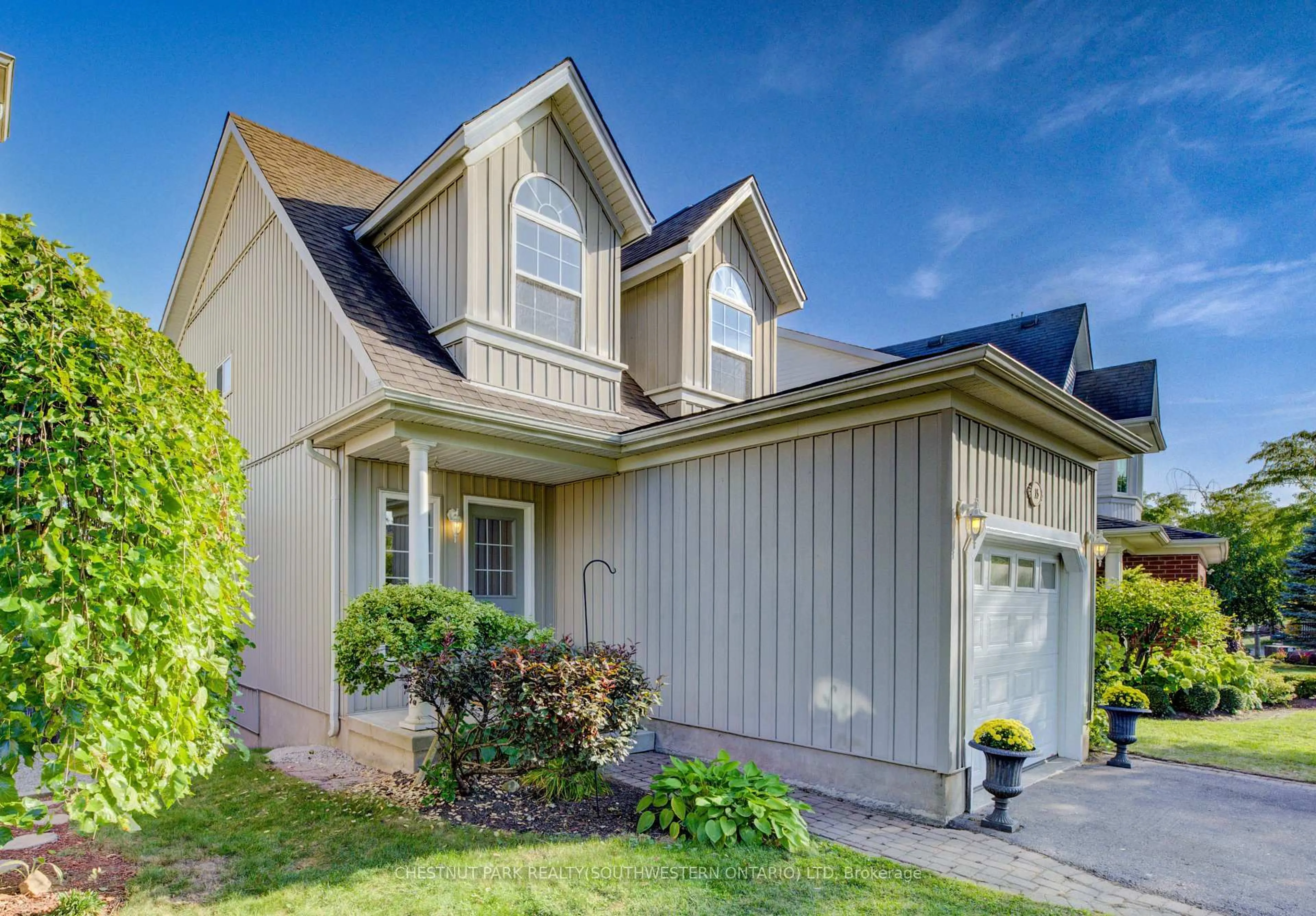 Home with vinyl exterior material, street for 15 Pettitt Dr, Guelph Ontario N1E 7G7