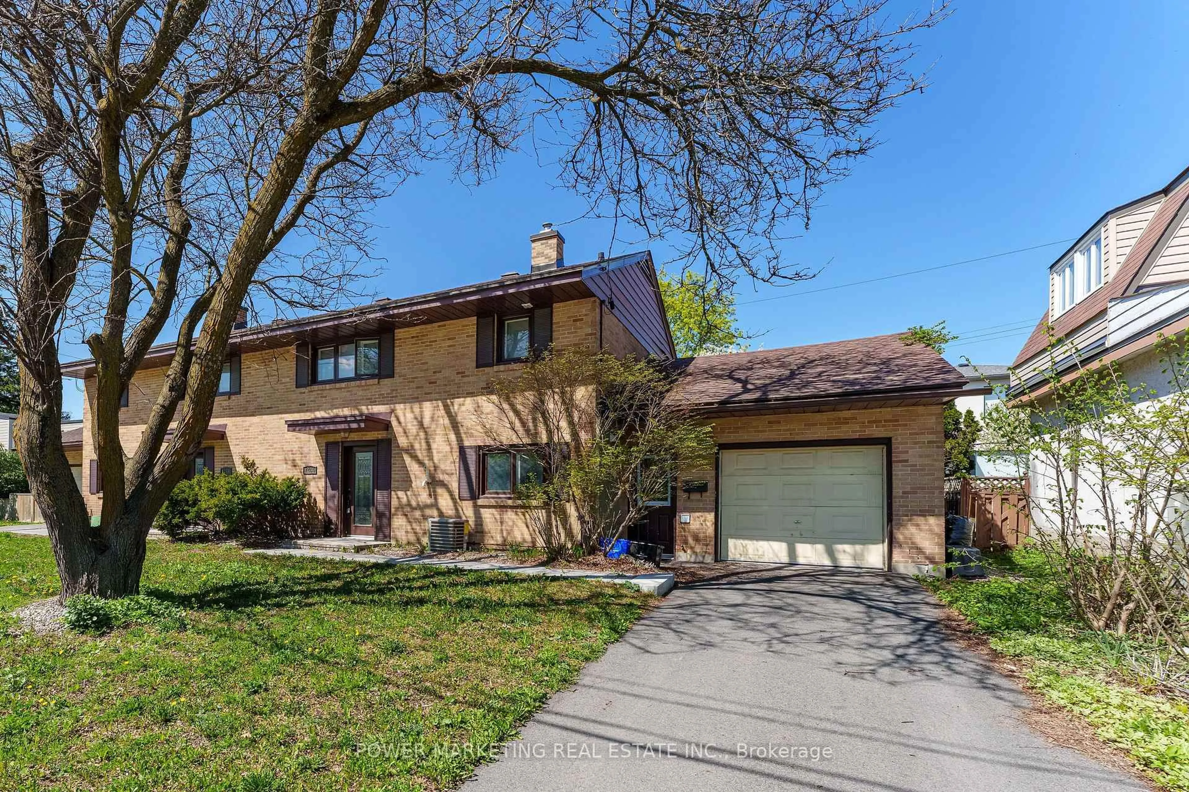 Home with brick exterior material, street for 1244 PRINCE OF WALES Dr, Ottawa Ontario K2C 1M9