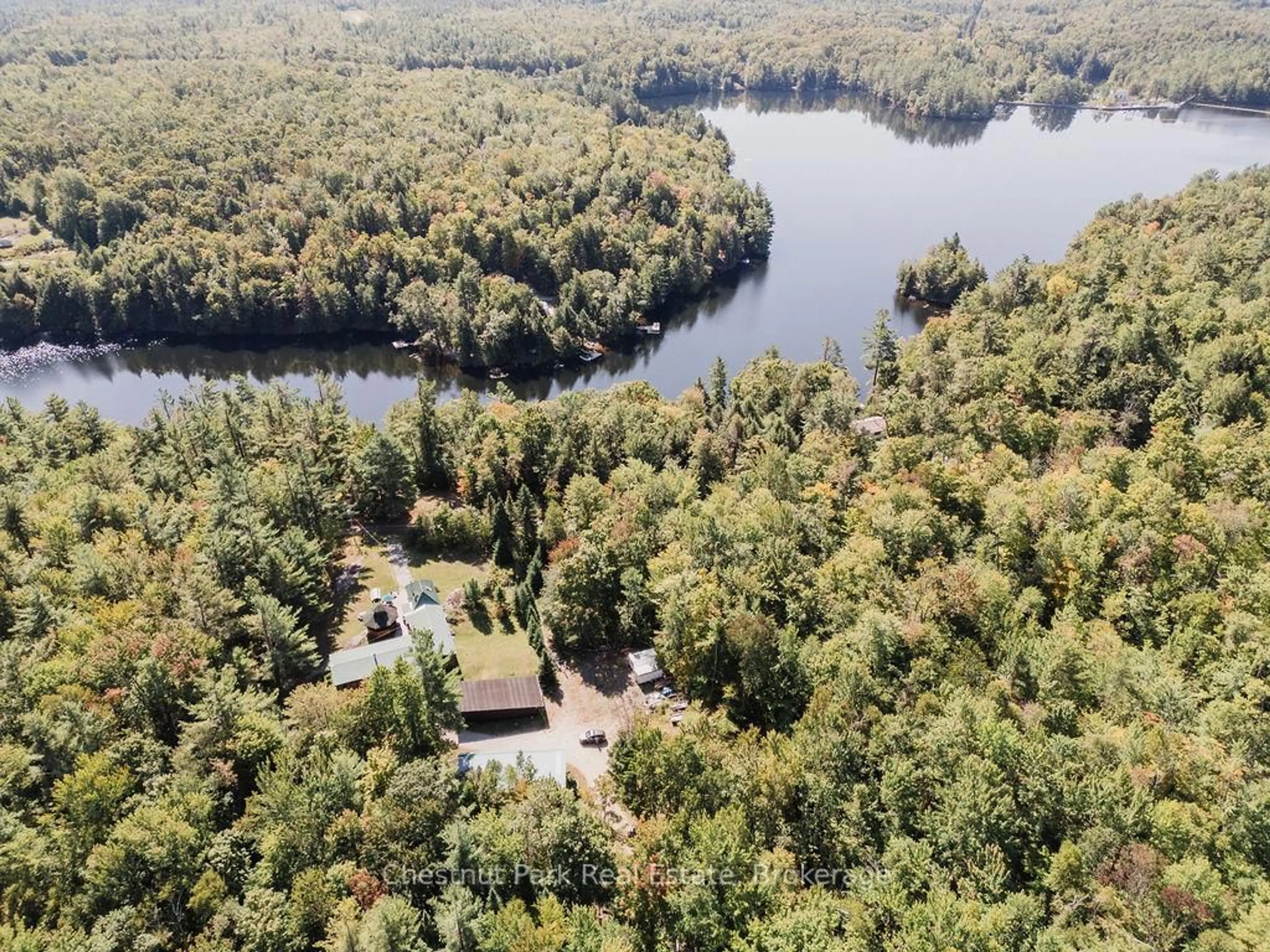 A pic from outside/outdoor area/front of a property/back of a property/a pic from drone, water/lake/river/ocean view for 1150 CARLSMOUNT Rd, Bracebridge Ontario P1L 1X1