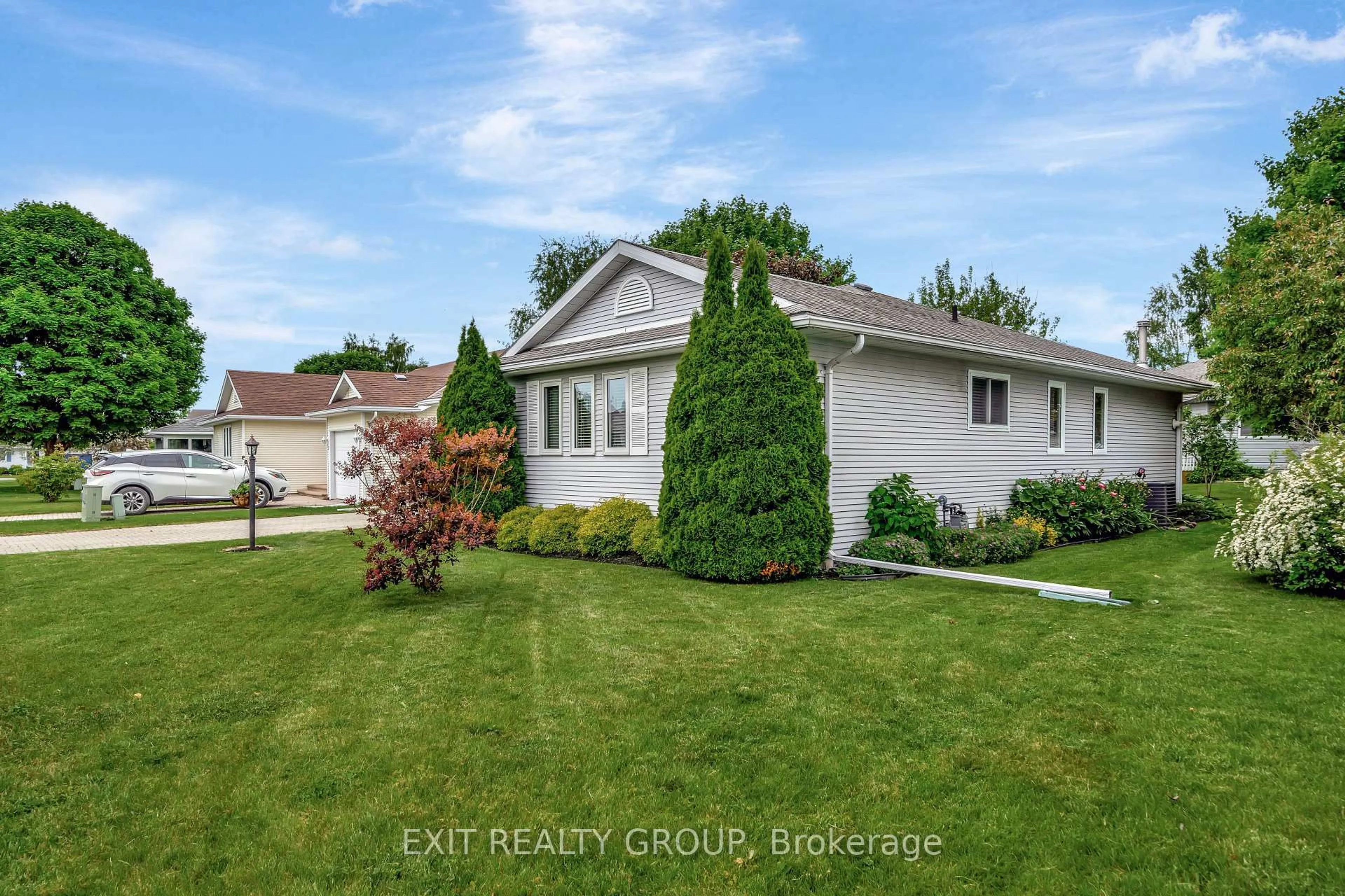 A pic from outside/outdoor area/front of a property/back of a property/a pic from drone, street for 5 Cretney Dr, Prince Edward County Ontario K0K 3L0