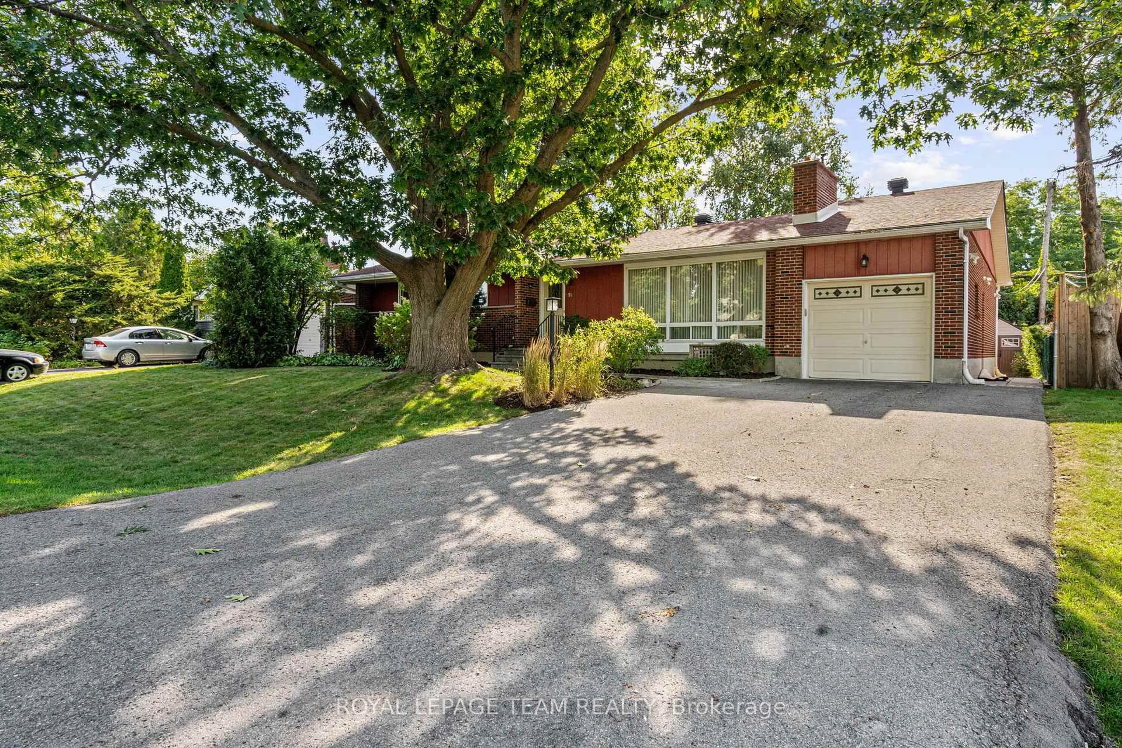 Home with brick exterior material, street for 98 Starwood Rd, Ottawa Ontario K2G 1Z7