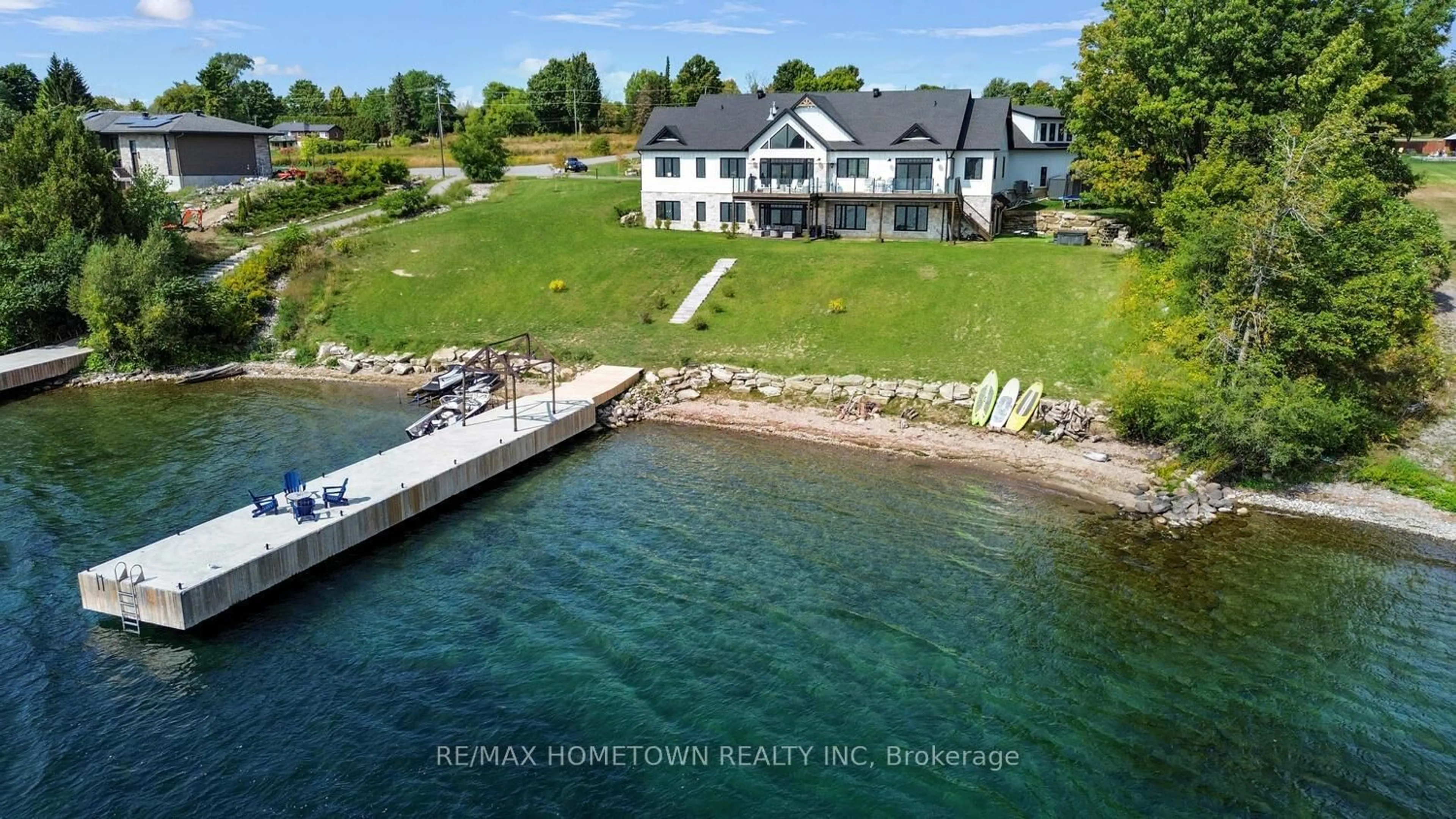 A pic from outside/outdoor area/front of a property/back of a property/a pic from drone, water/lake/river/ocean view for 5 Shoreside Way, Augusta Ontario K6V 5T1