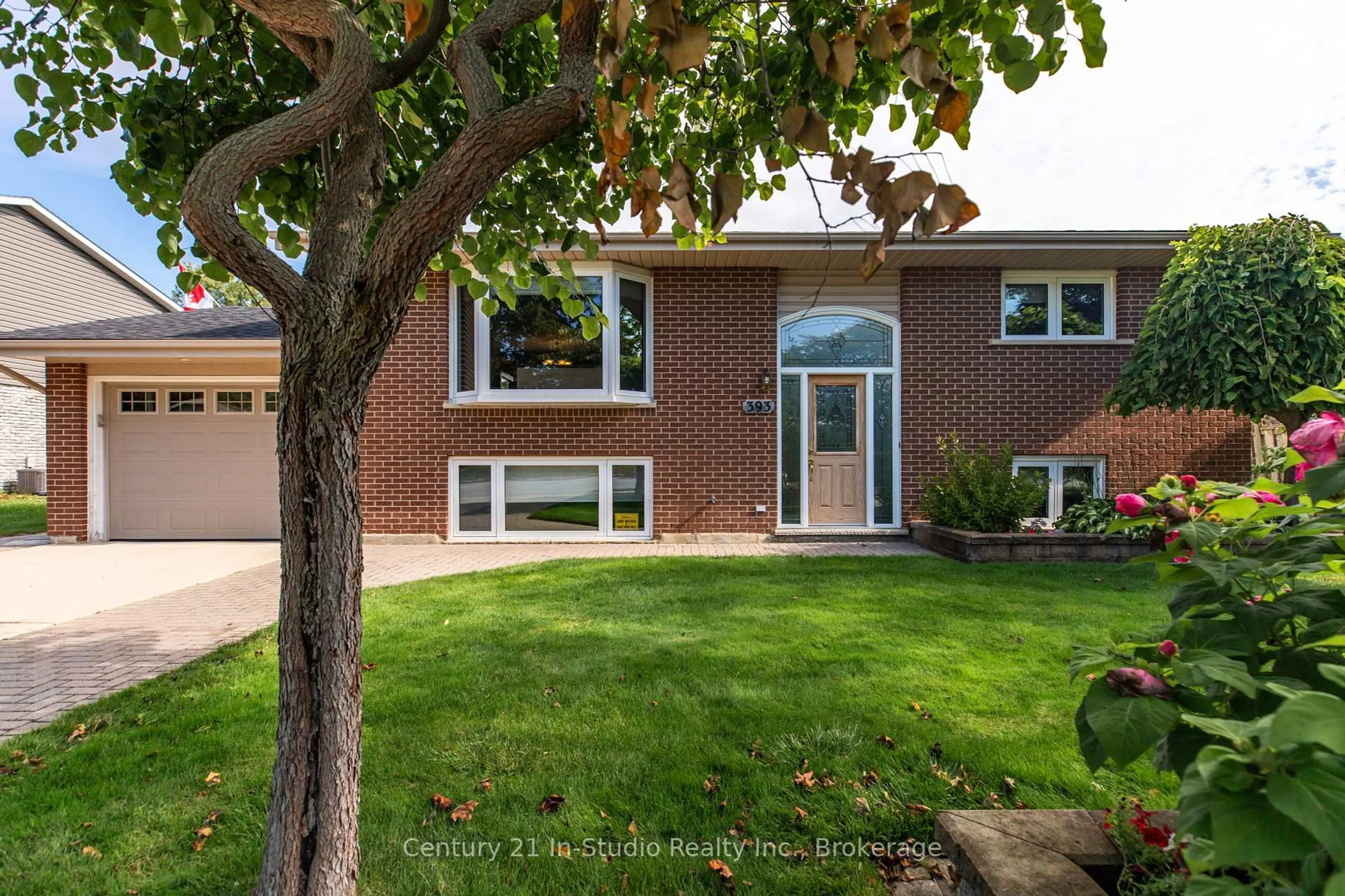 Home with brick exterior material, street for 393 Crawford St, Saugeen Shores Ontario N0H 2C2