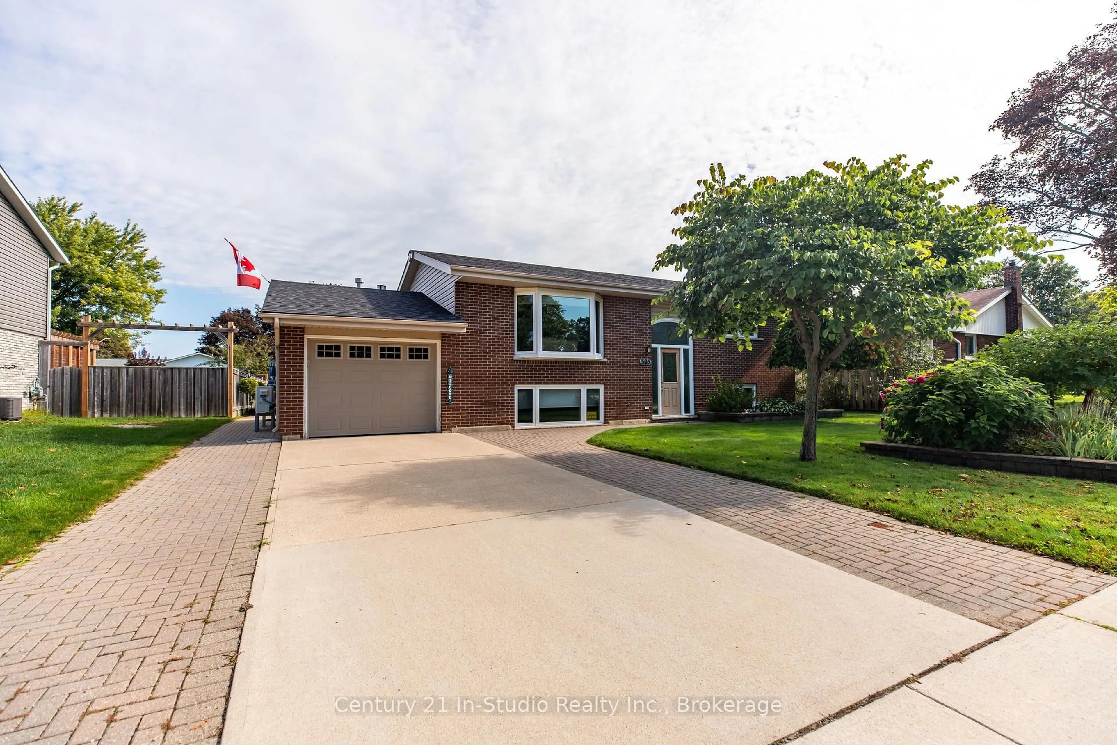 Home with brick exterior material, street for 393 Crawford St, Saugeen Shores Ontario N0H 2C2