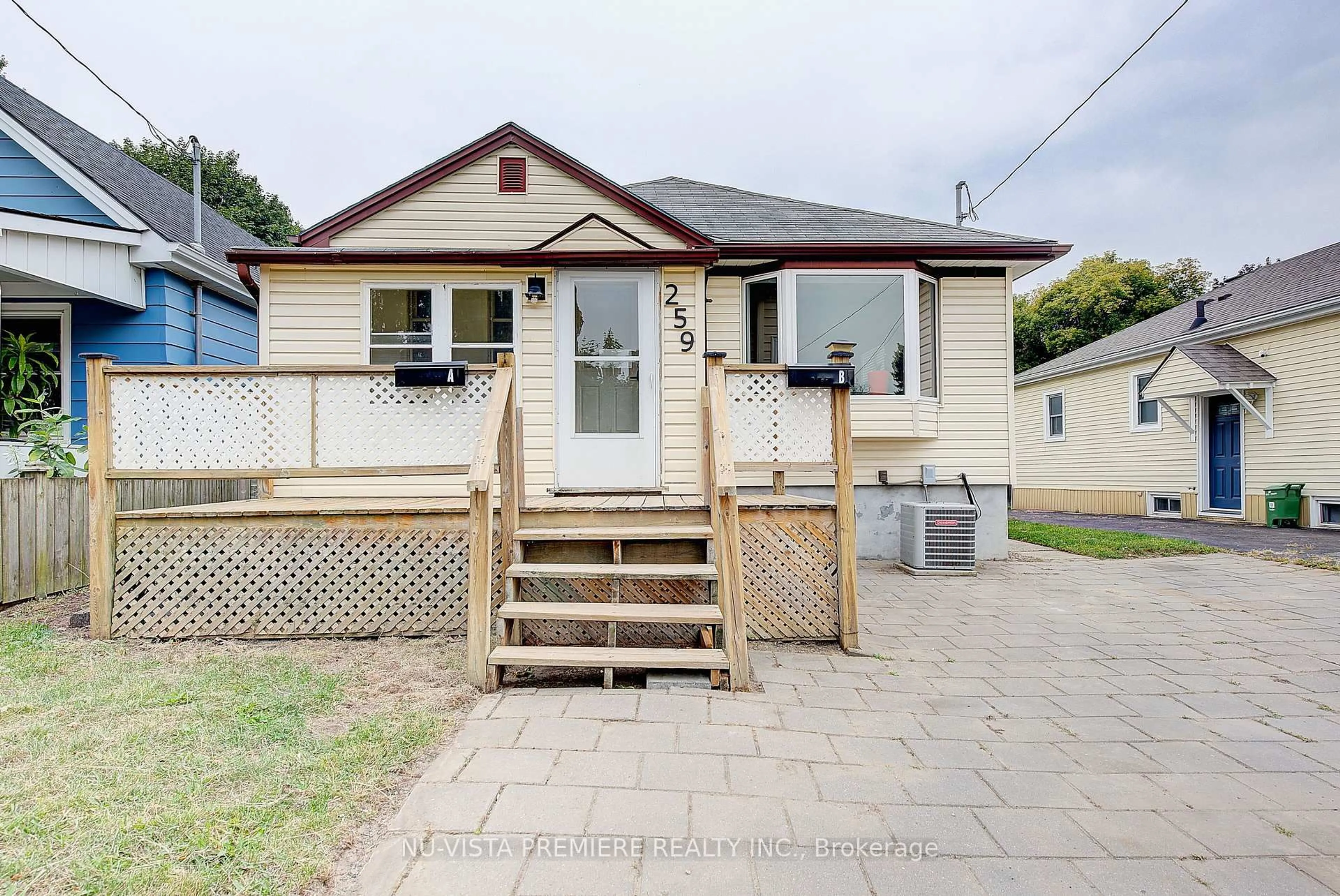 Home with vinyl exterior material, street for 259 Sanders St, London East Ontario N5Z 2T1