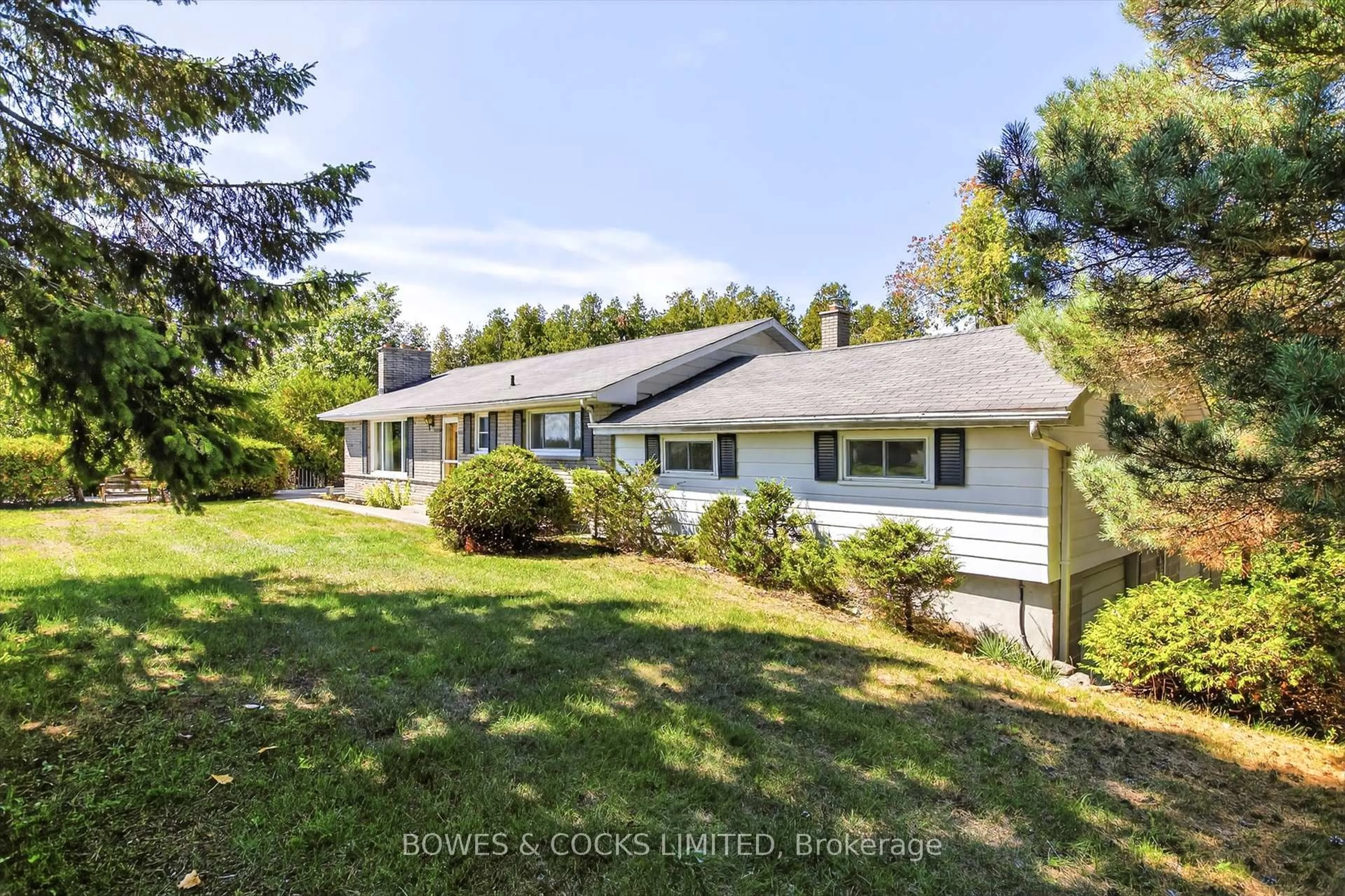 A pic from outside/outdoor area/front of a property/back of a property/a pic from drone, unknown for 374 County Road 4, Douro-Dummer Ontario K9J 6Y2