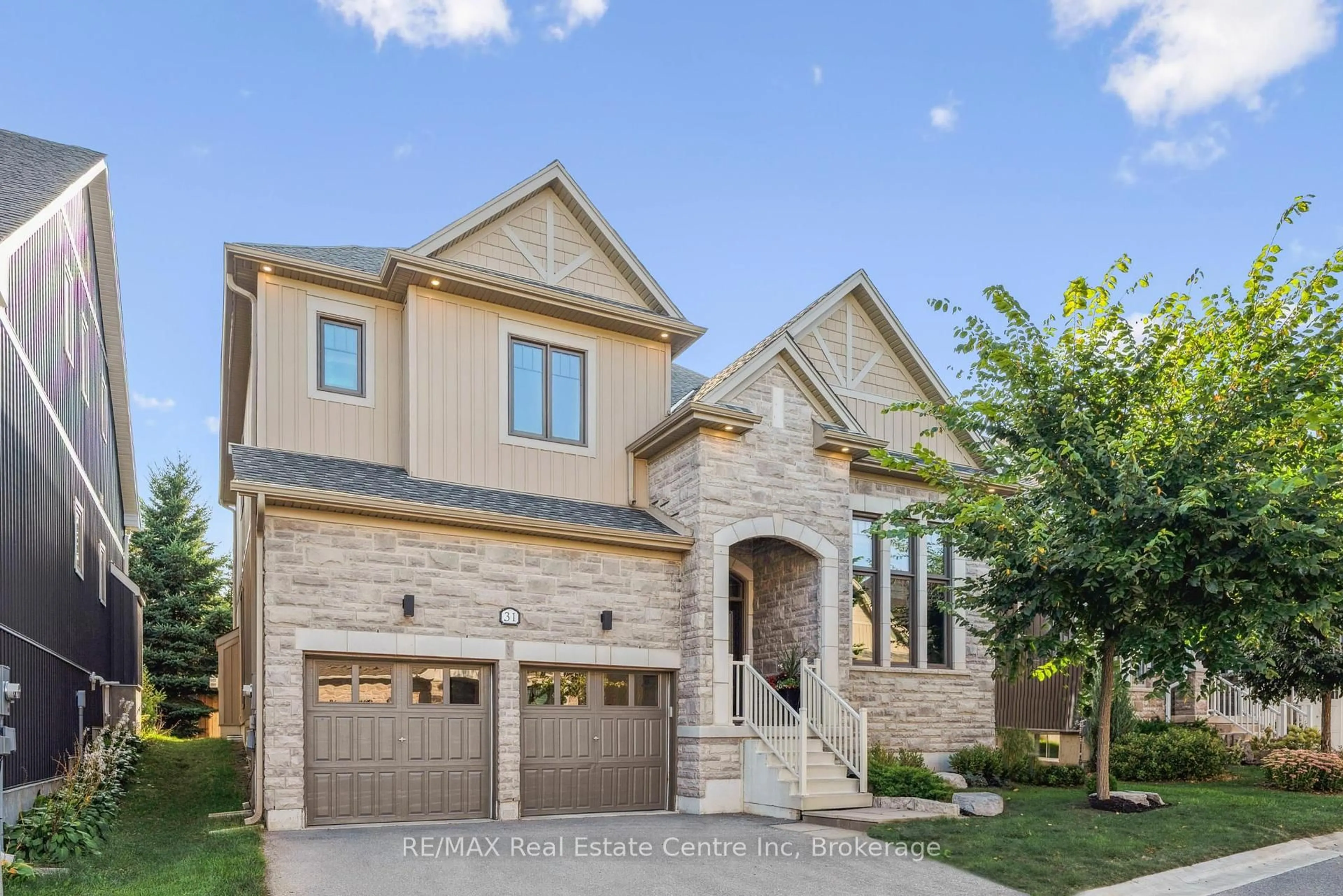 Home with brick exterior material, street for 31 EMENY Lane, Guelph Ontario N1L 0H3