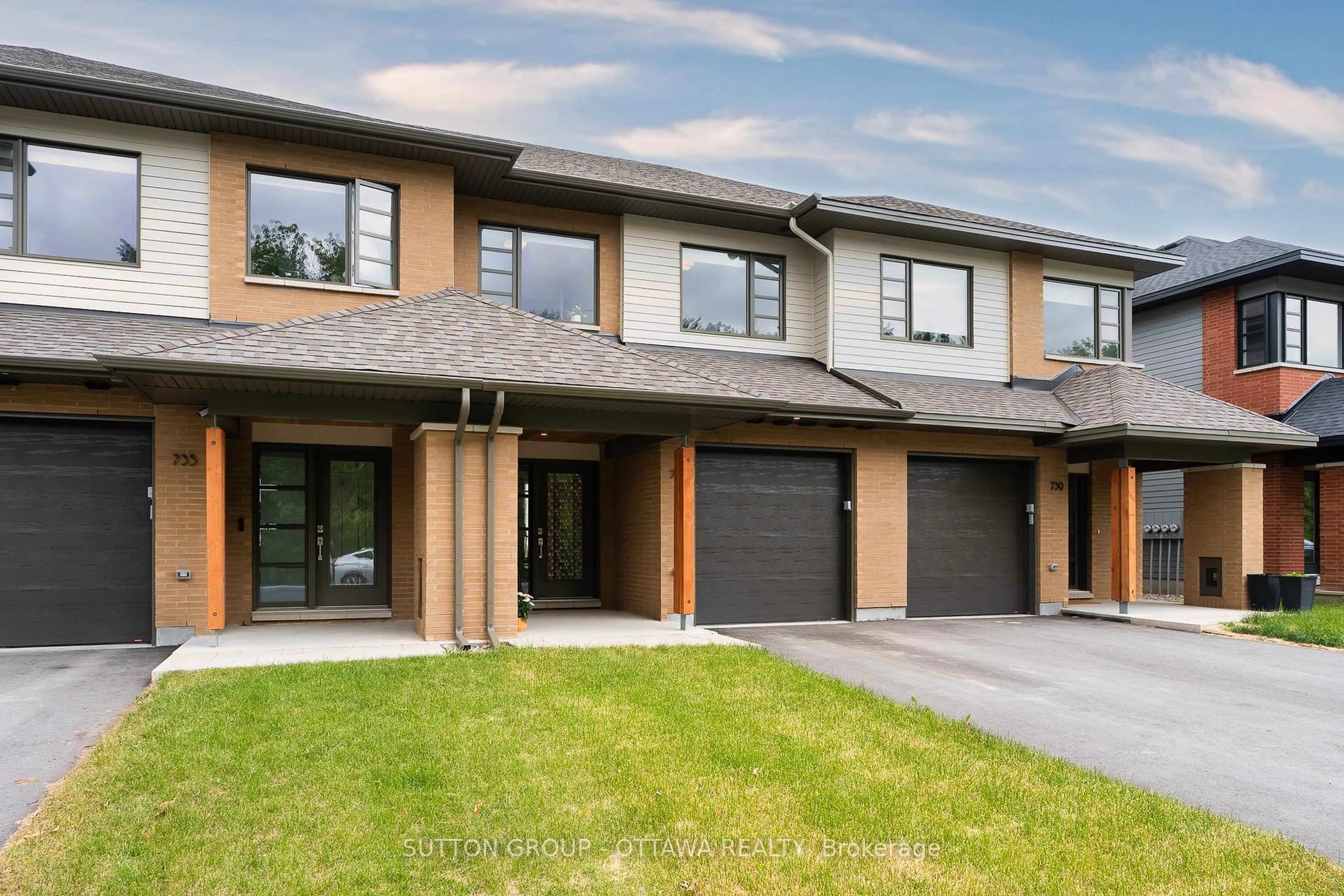 Home with brick exterior material, street for 737 Acai Way, Ottawa Ontario K1X 0K1