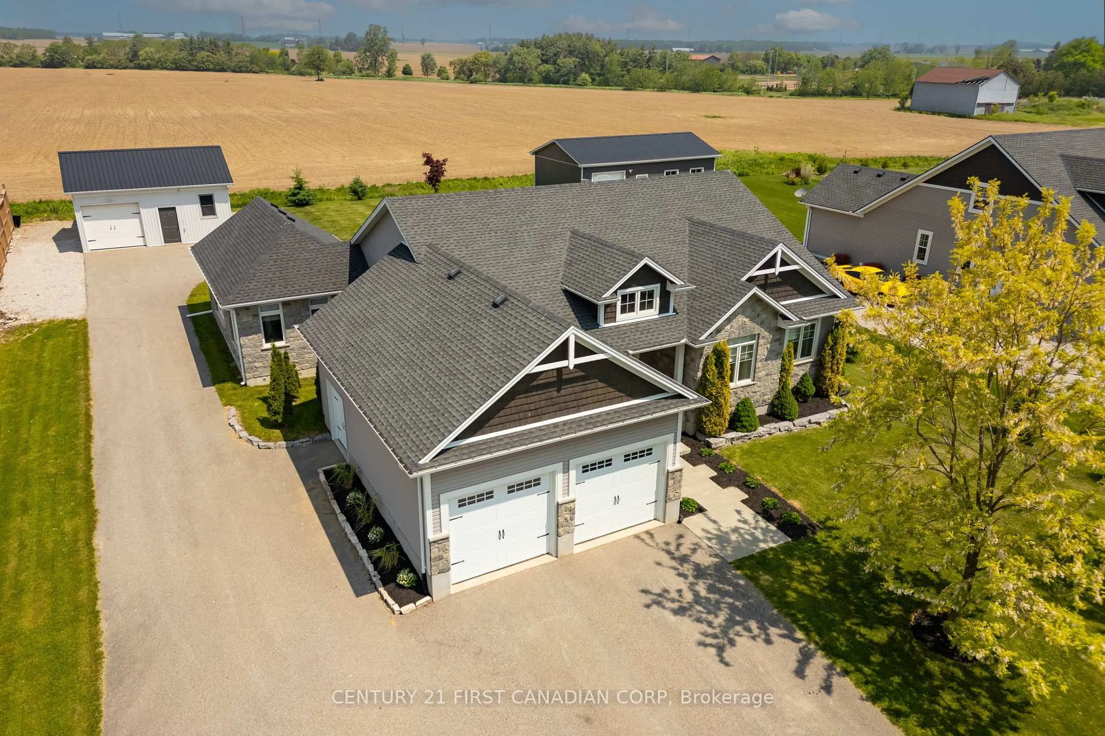 A pic from outside/outdoor area/front of a property/back of a property/a pic from drone, street for 51000 RON MCNEIL Line, Malahide Ontario N0L 2J0