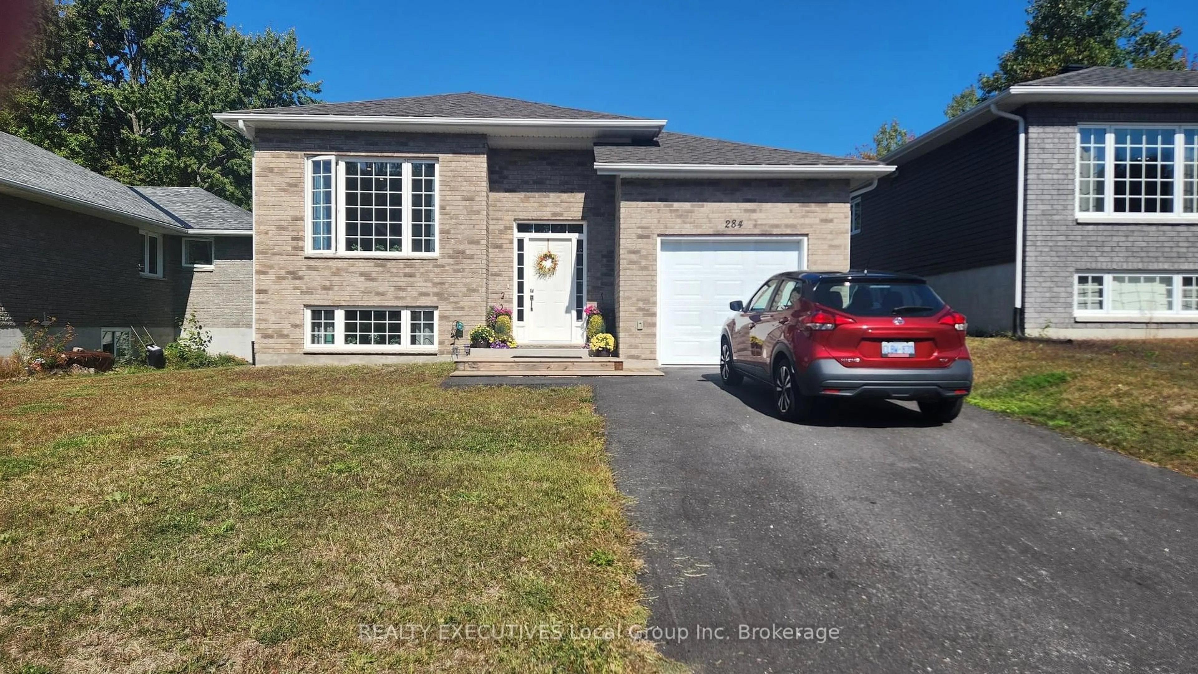 Home with brick exterior material, street for 284 THELMA Ave, North Bay Ontario P1A 4M8