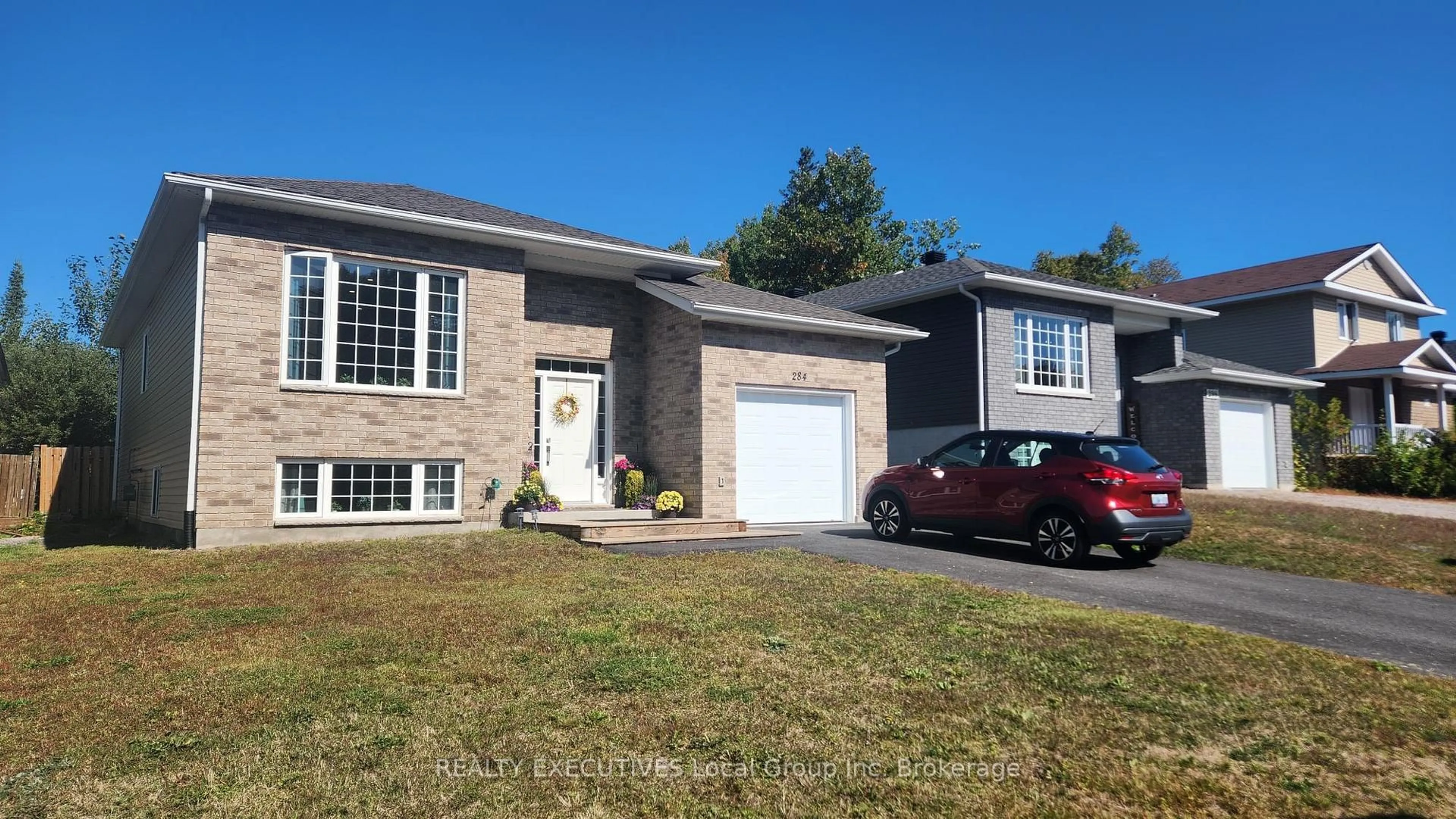 Home with brick exterior material, street for 284 THELMA Ave, North Bay Ontario P1A 4M8