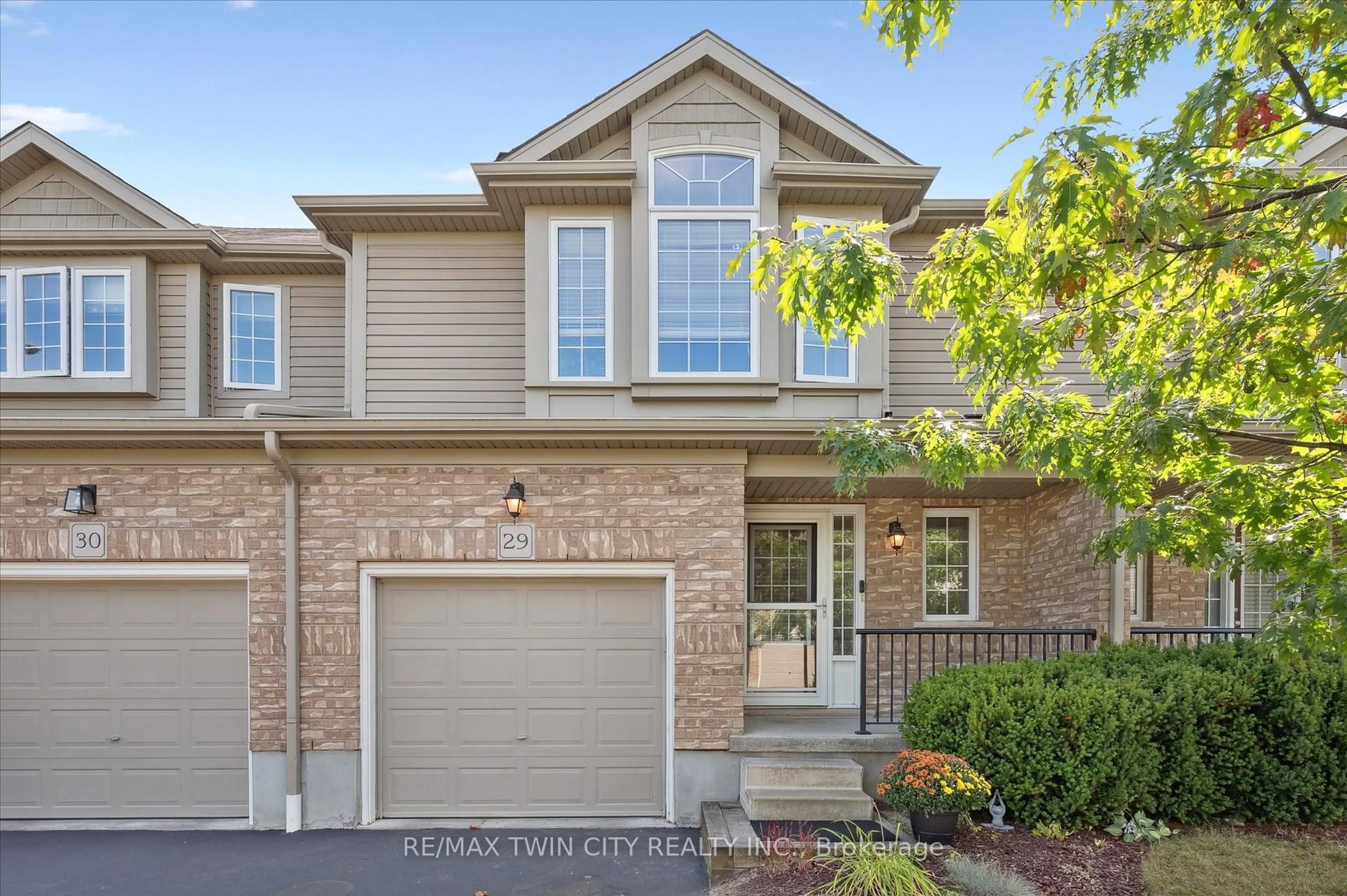 Home with brick exterior material, street for 555 Chablis Dr #29, Waterloo Ontario N2T 0A5