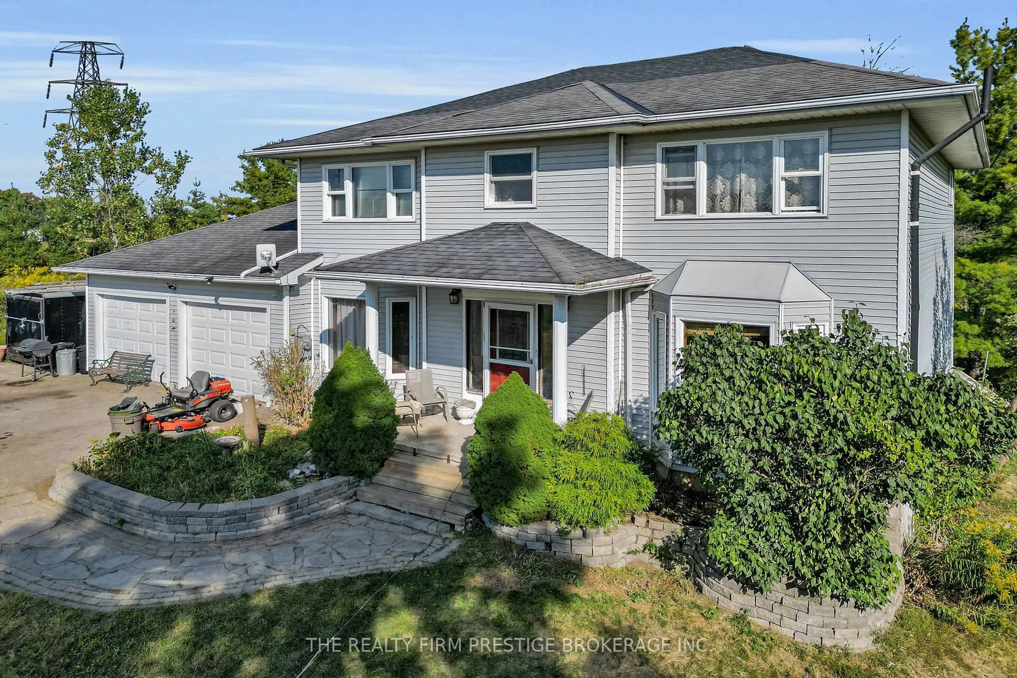A pic from outside/outdoor area/front of a property/back of a property/a pic from drone, street for 36315 Talbot Line, Southwold Ontario N0L 2E0