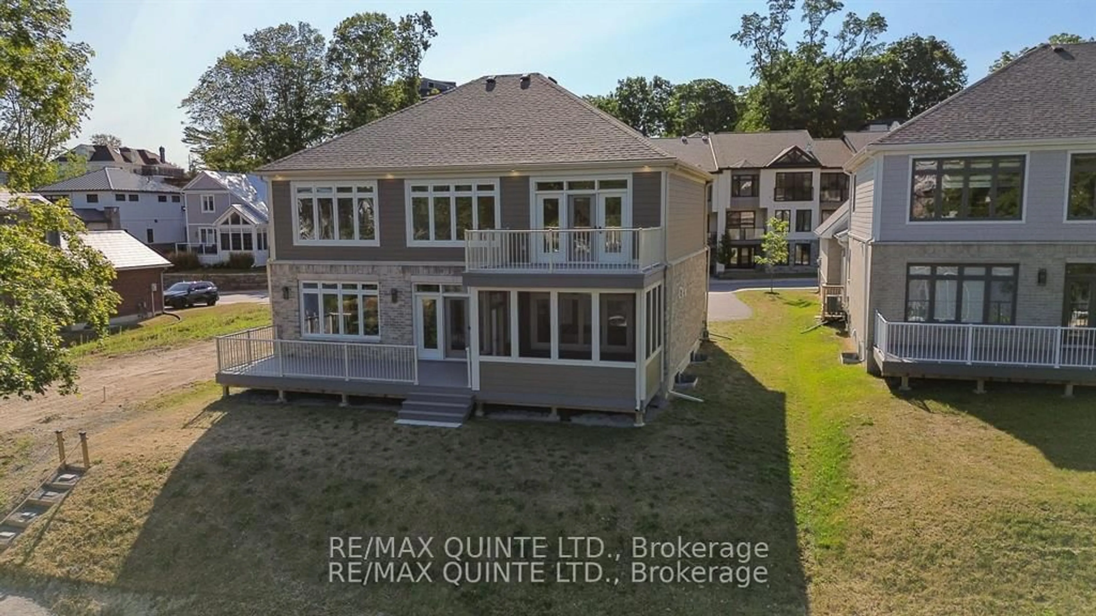 A pic from outside/outdoor area/front of a property/back of a property/a pic from drone, water/lake/river/ocean view for 125 Villeneuve Dr, Prince Edward County Ontario K0K 2T0