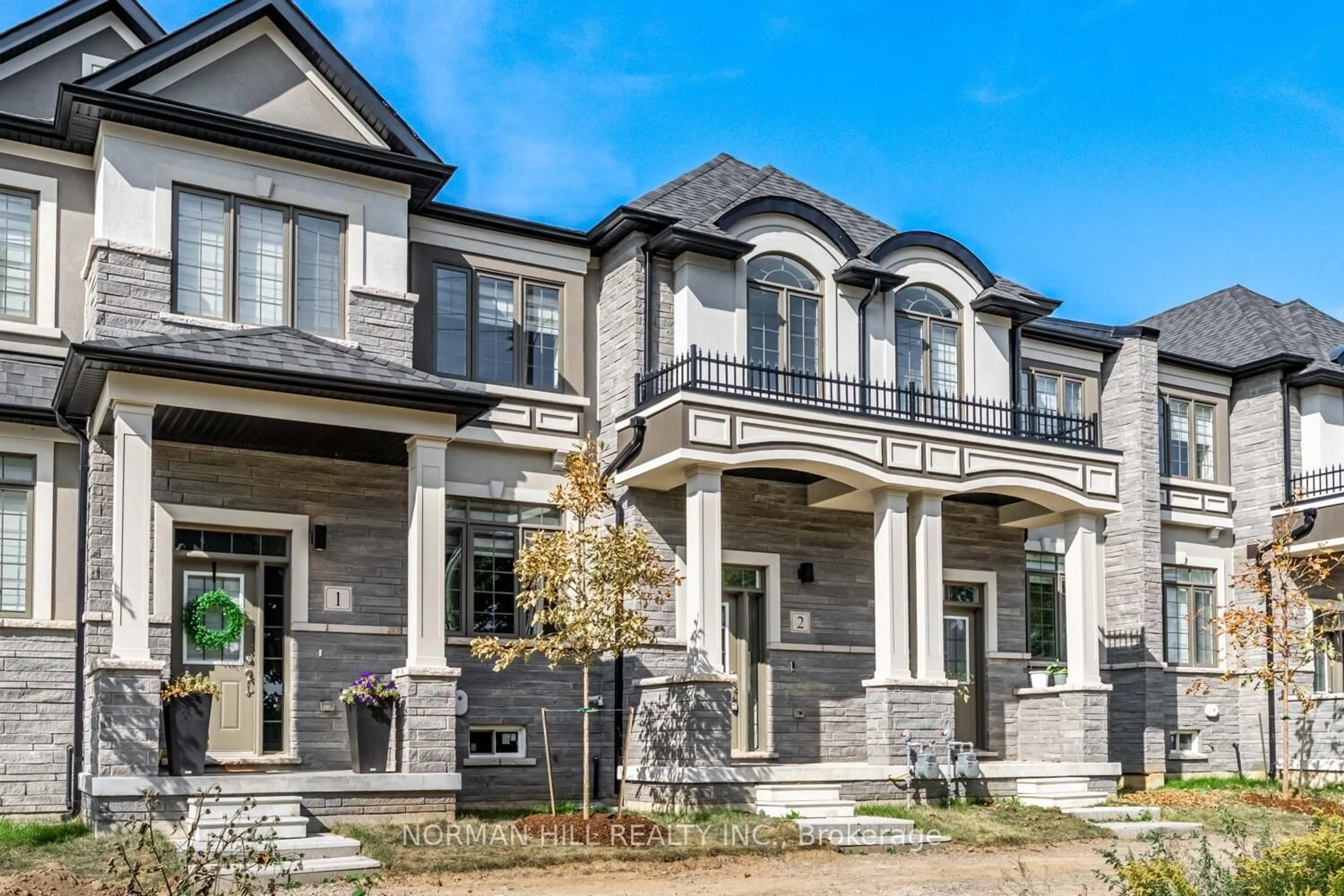 Home with brick exterior material, street for 305 Garner Rd #2, Hamilton Ontario L9G 3E6