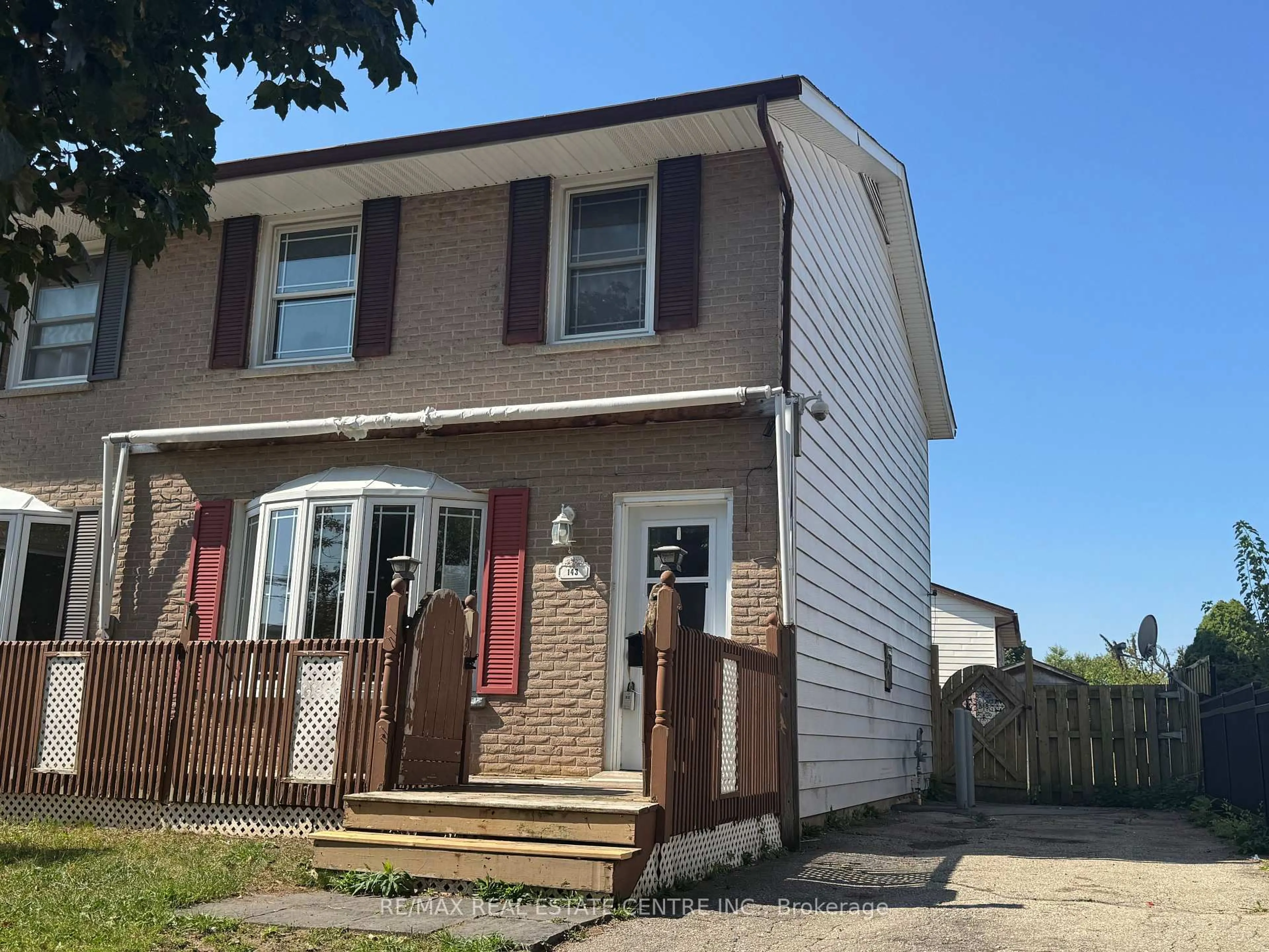 Home with vinyl exterior material, street for 143 Rouse Ave, Cambridge Ontario N1R 4M9