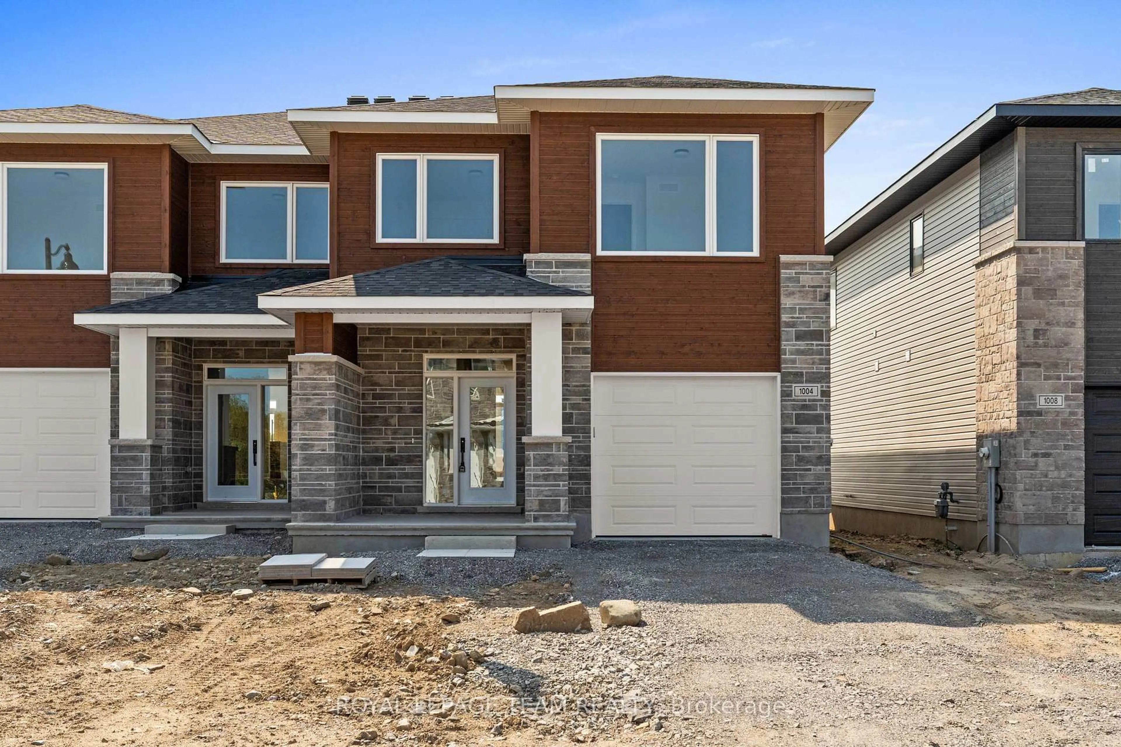 Home with brick exterior material, street for 1004 Moore St, Brockville Ontario K6V 7N1
