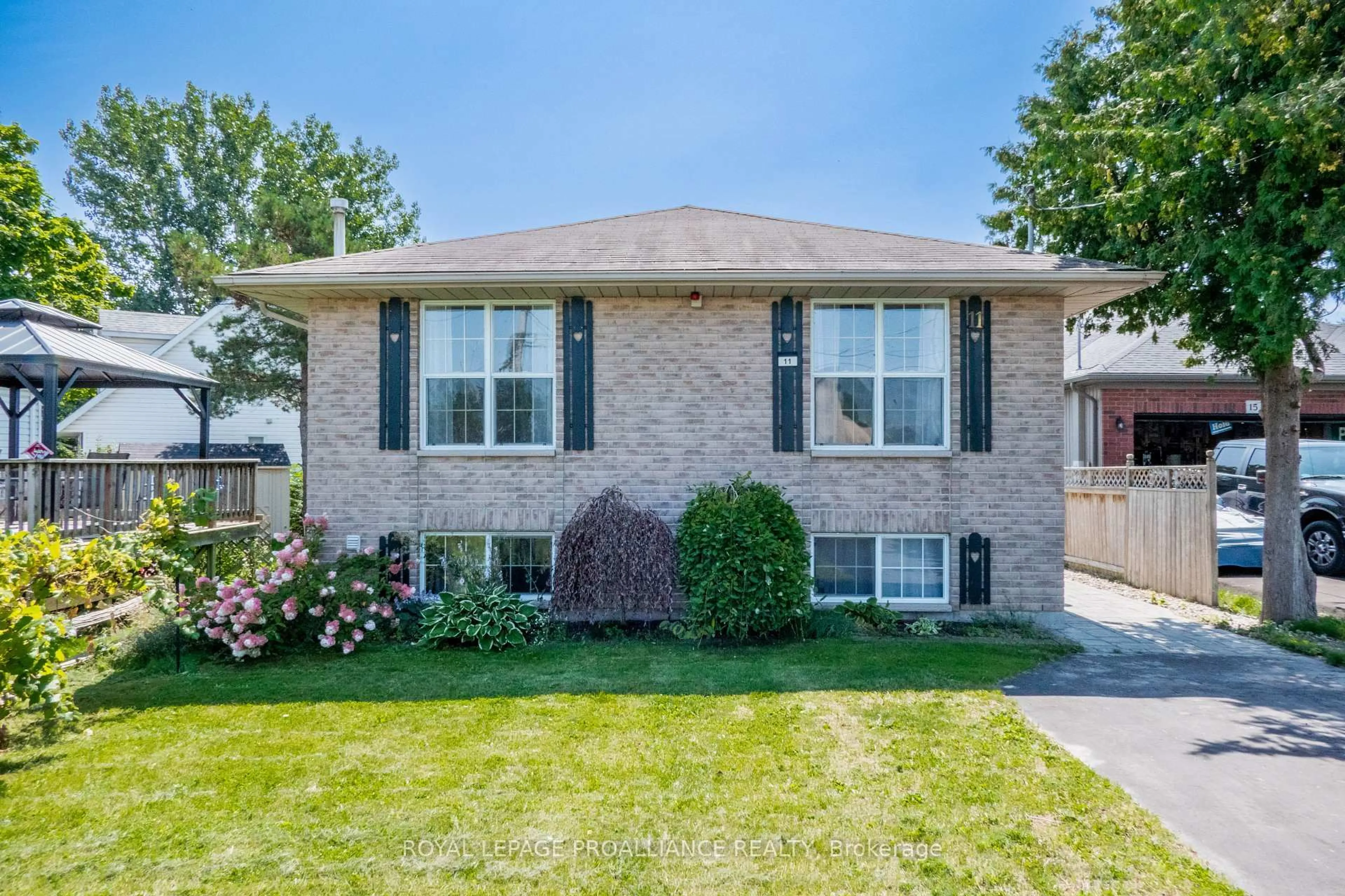 Home with brick exterior material, street for 11 Carrying Place Rd, Quinte West Ontario K8V 3E6
