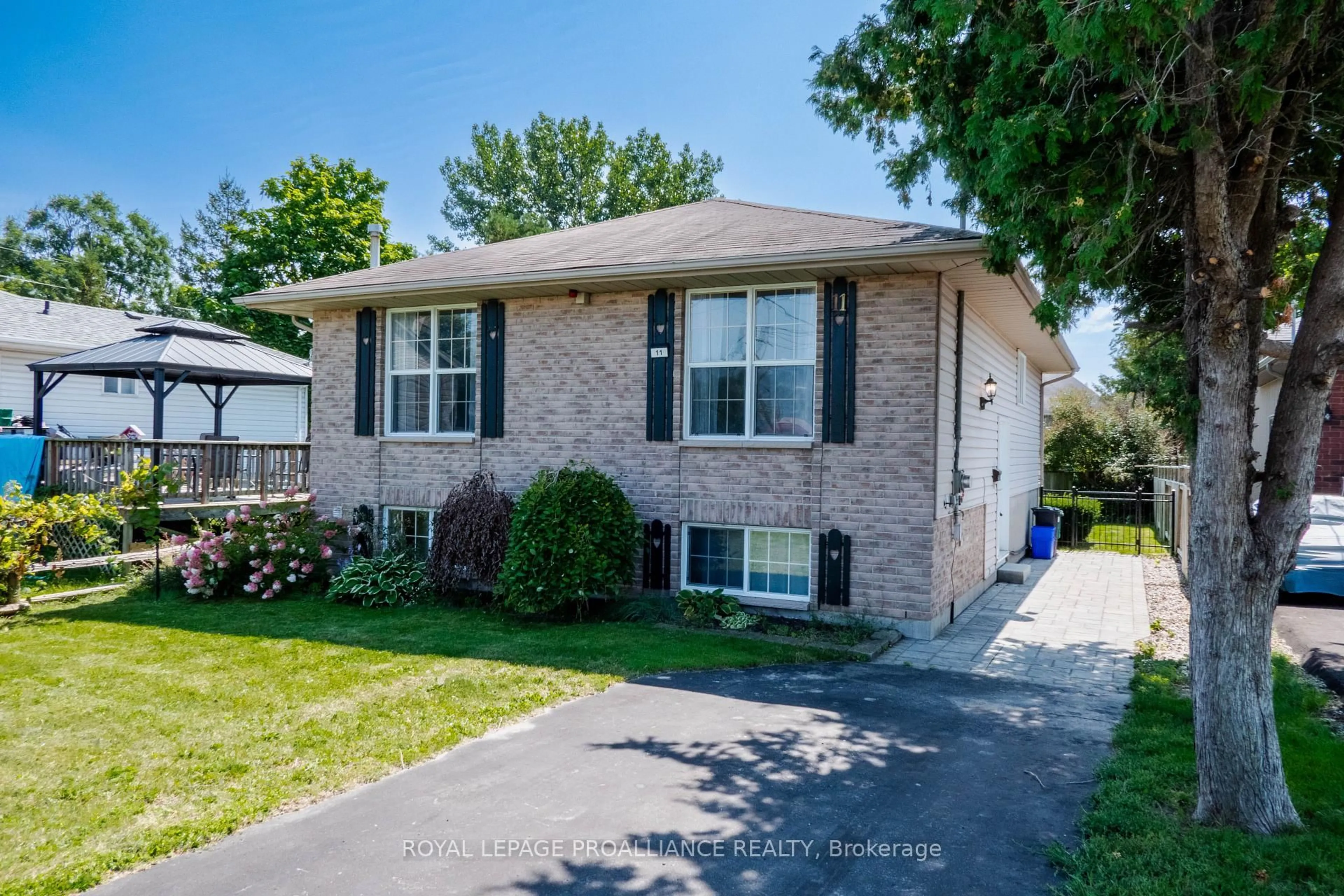 Home with brick exterior material, street for 11 Carrying Place Rd, Quinte West Ontario K8V 3E6