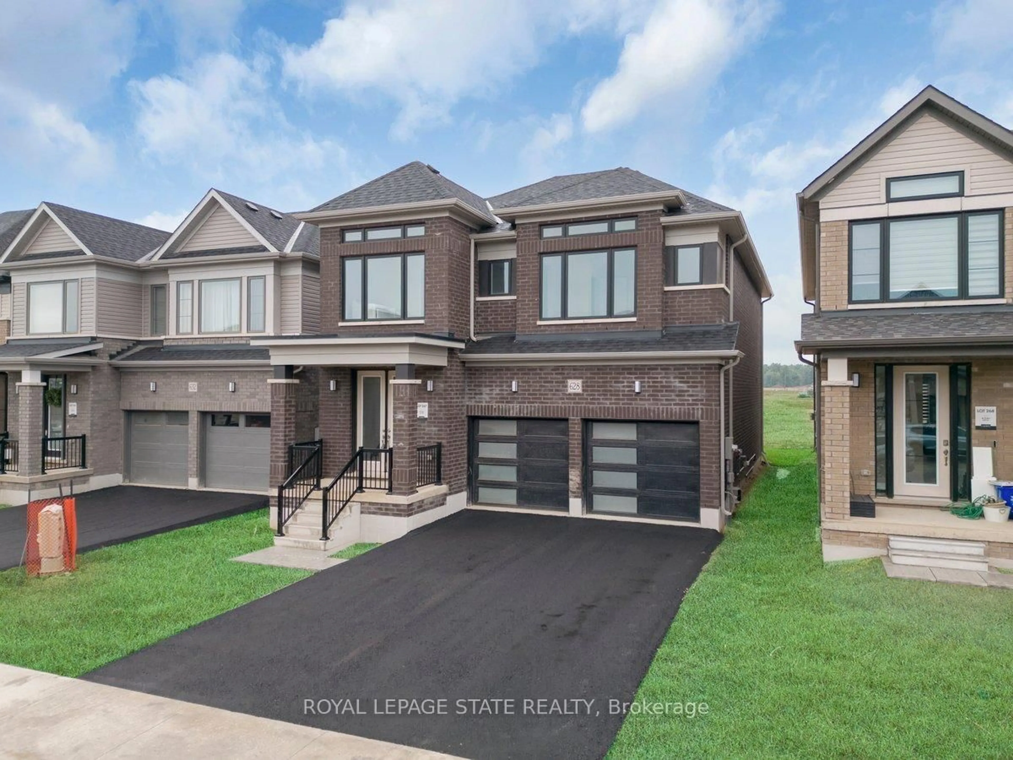 Home with brick exterior material, street for 628 Windwood Dr, Hamilton Ontario L0R 1C0