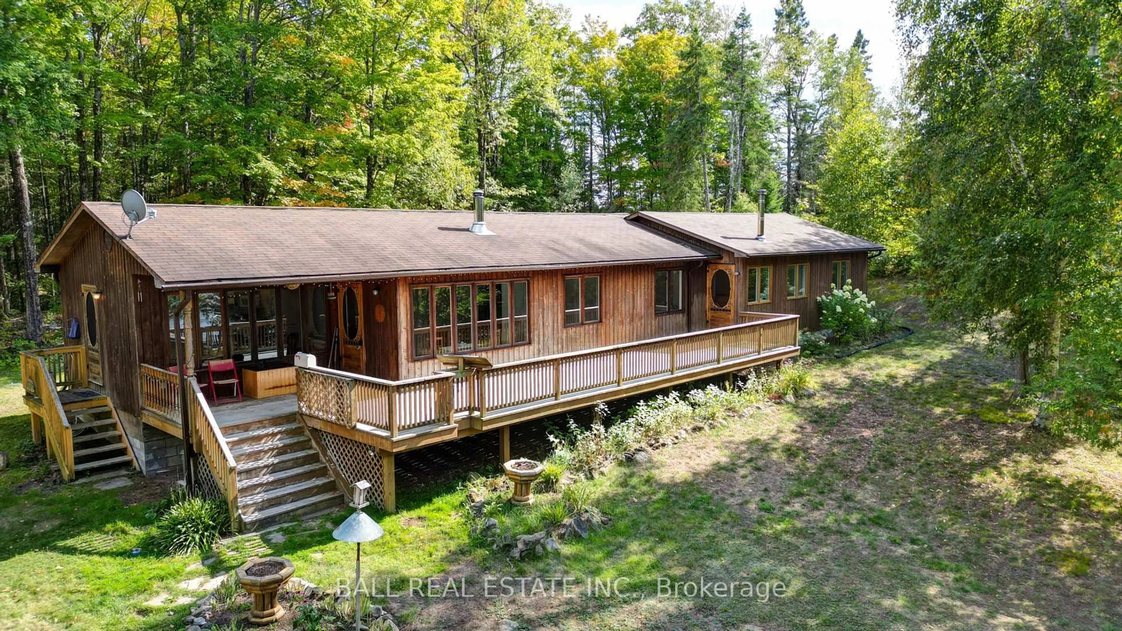 A pic from outside/outdoor area/front of a property/back of a property/a pic from drone, forest/trees view for 226 Peter Lane, Coe Hill Ontario K0L 1P0