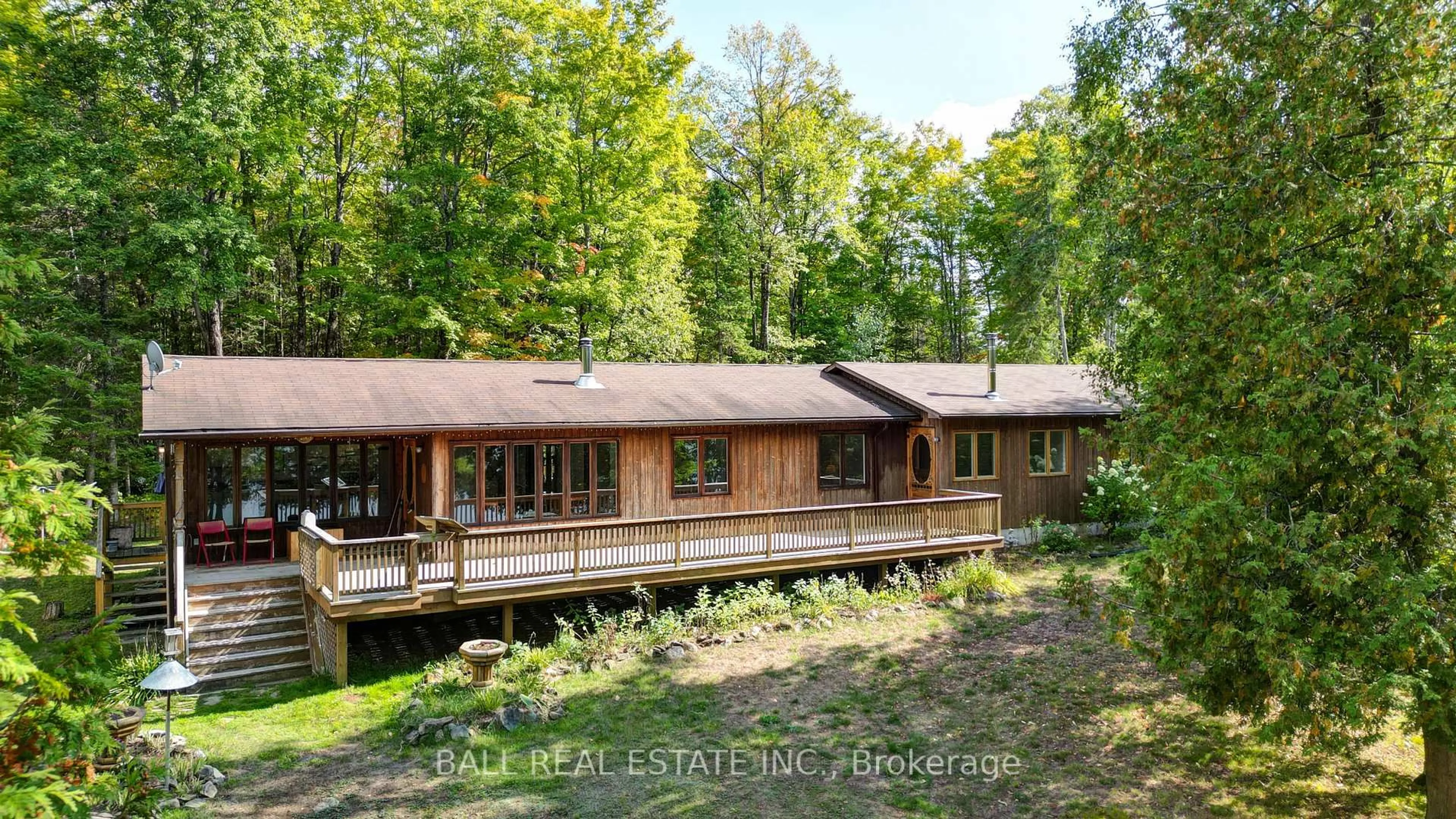A pic from outside/outdoor area/front of a property/back of a property/a pic from drone, forest/trees view for 226 Peter Lane, Coe Hill Ontario K0L 1P0